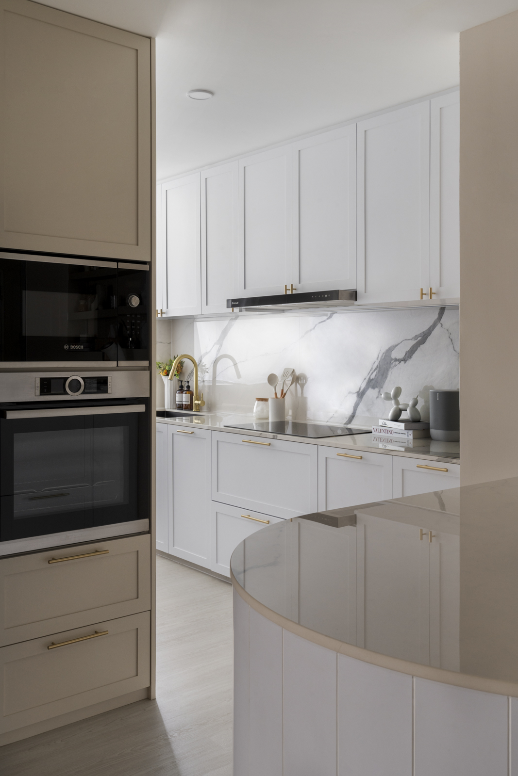 Embracing White Minimalism for Clean Aesthetics - Modern kitchen with sleek design, minimalist decor, white cabinets and