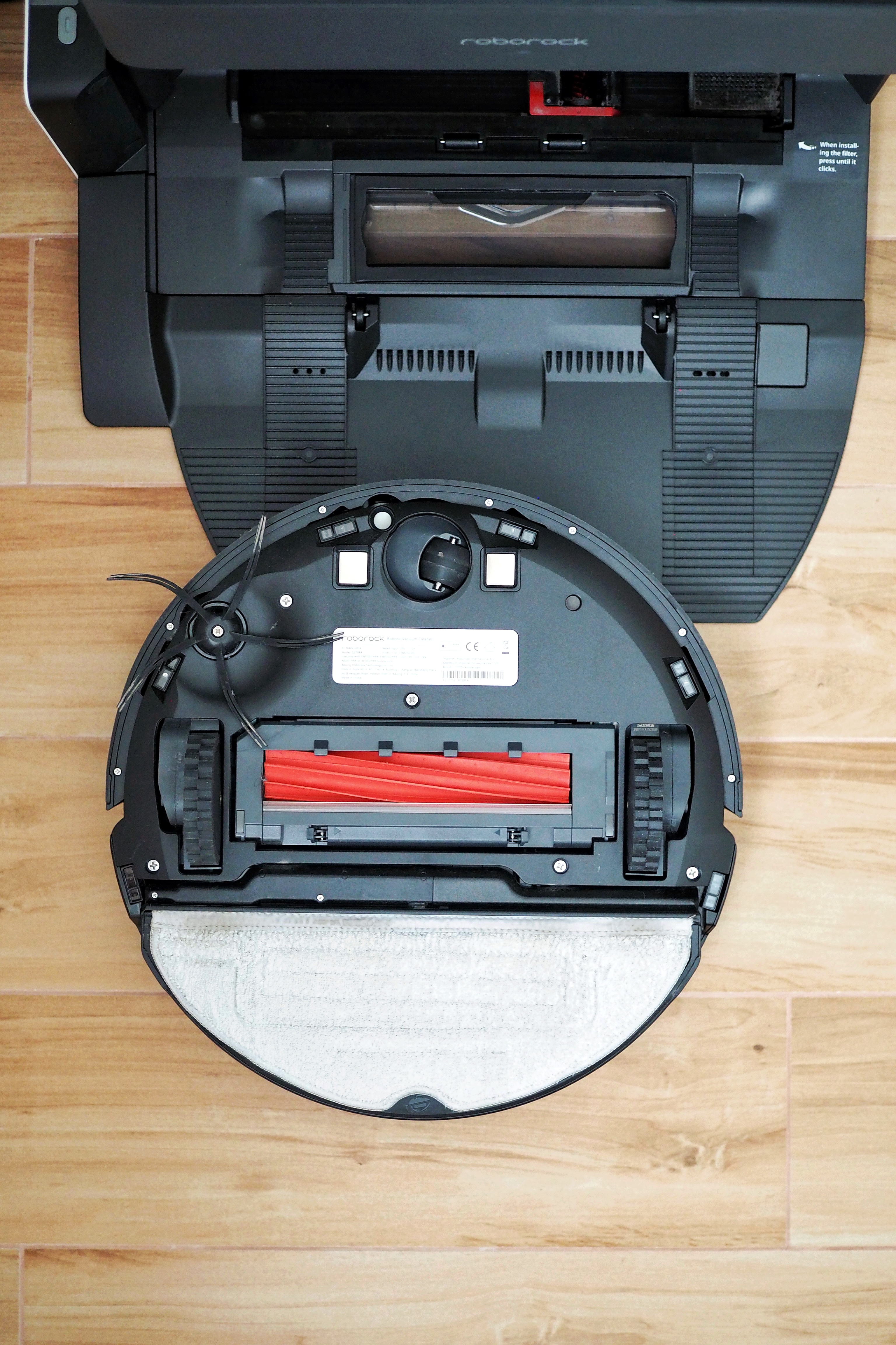 Value-for-money buys we can’t live without - Roborock printer with open dust bag, Interior of a Roborock printer, Dust bag