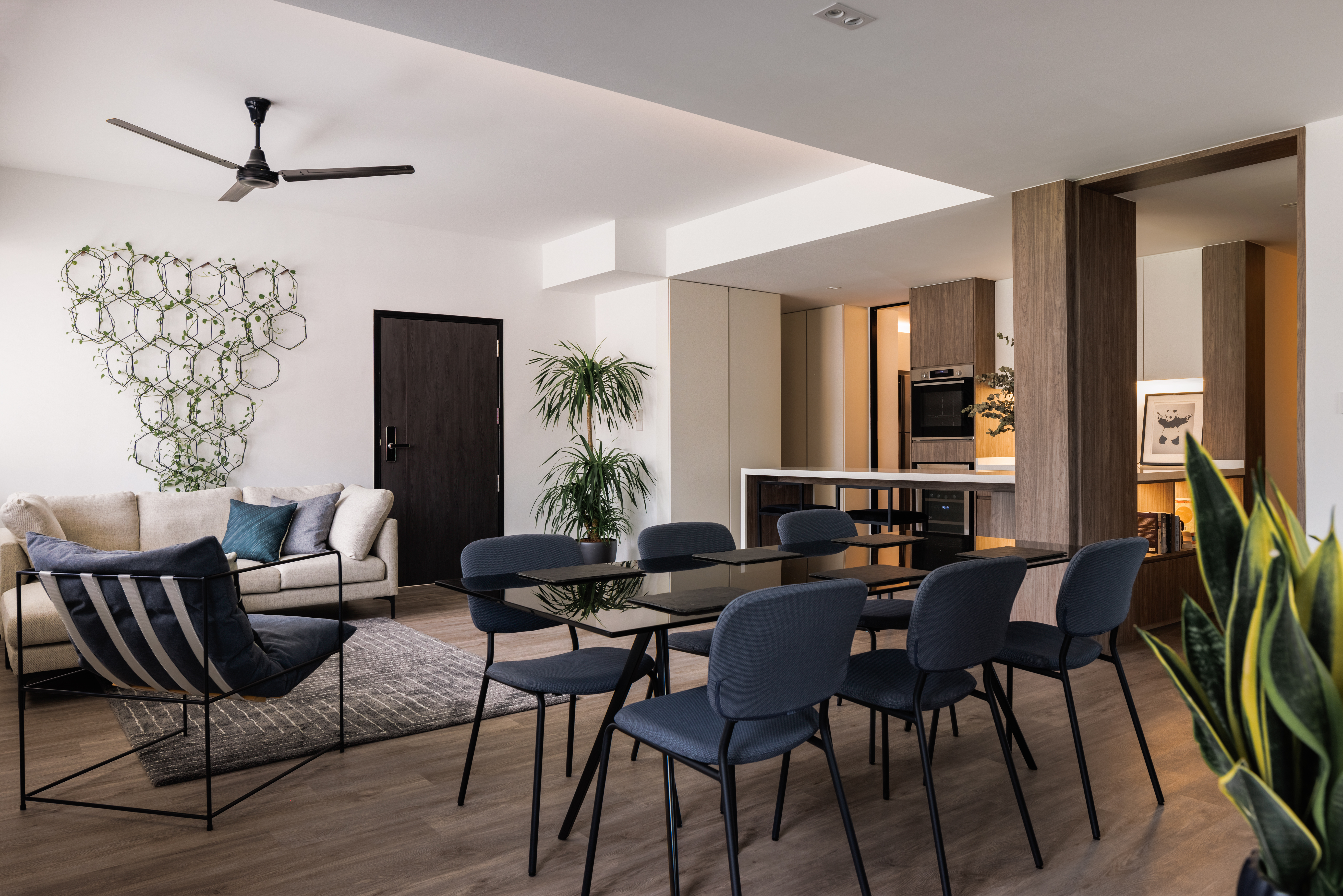 A Bright and Elegant Open Plan Home - Modern living room with sleek furniture, contemporary design, minimalist decor, large