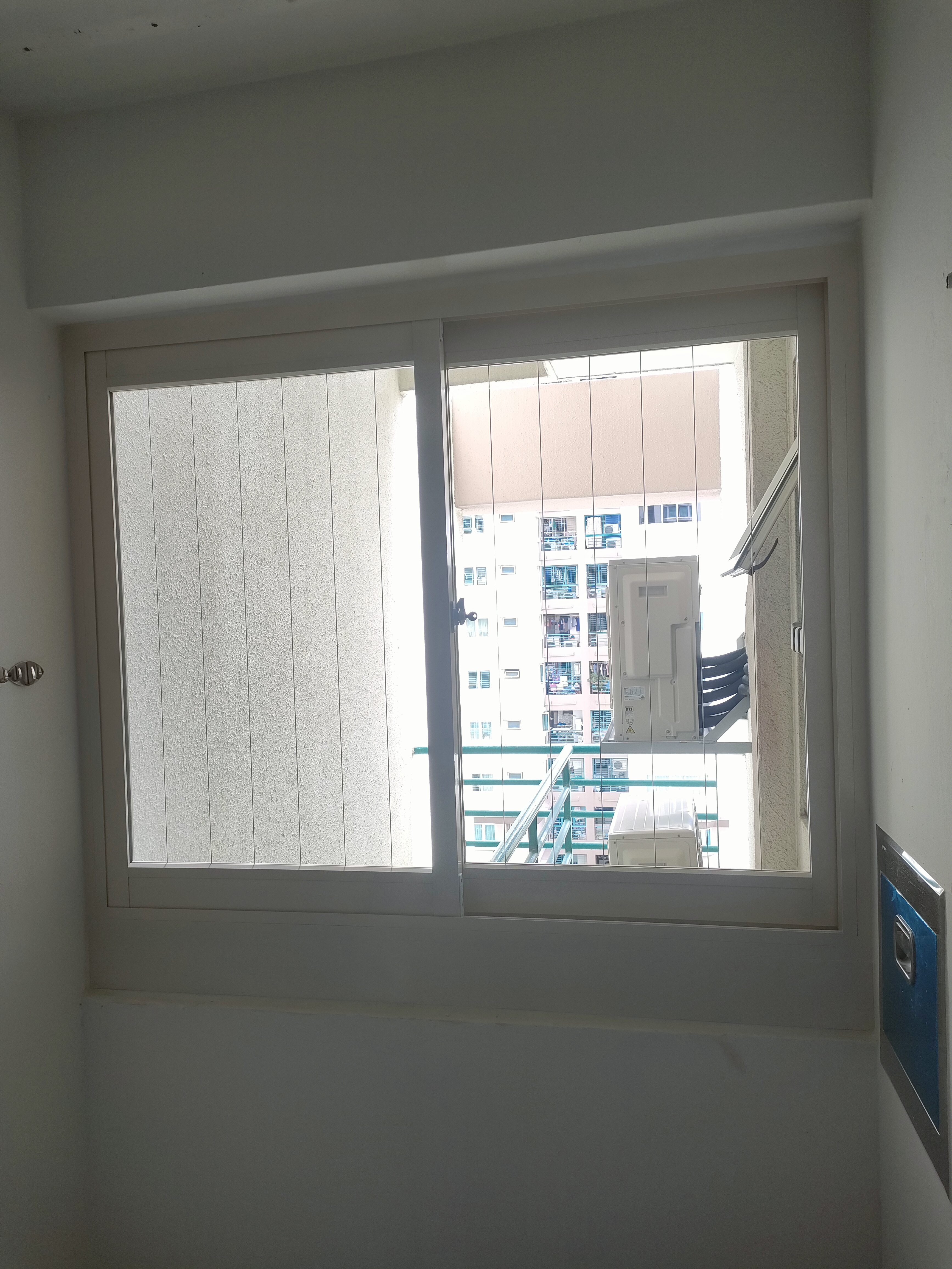 Our HOME has endless LOVE and LAUNDRY.... - Large window, white frame, exterior view, building, balcony, blue railing, air