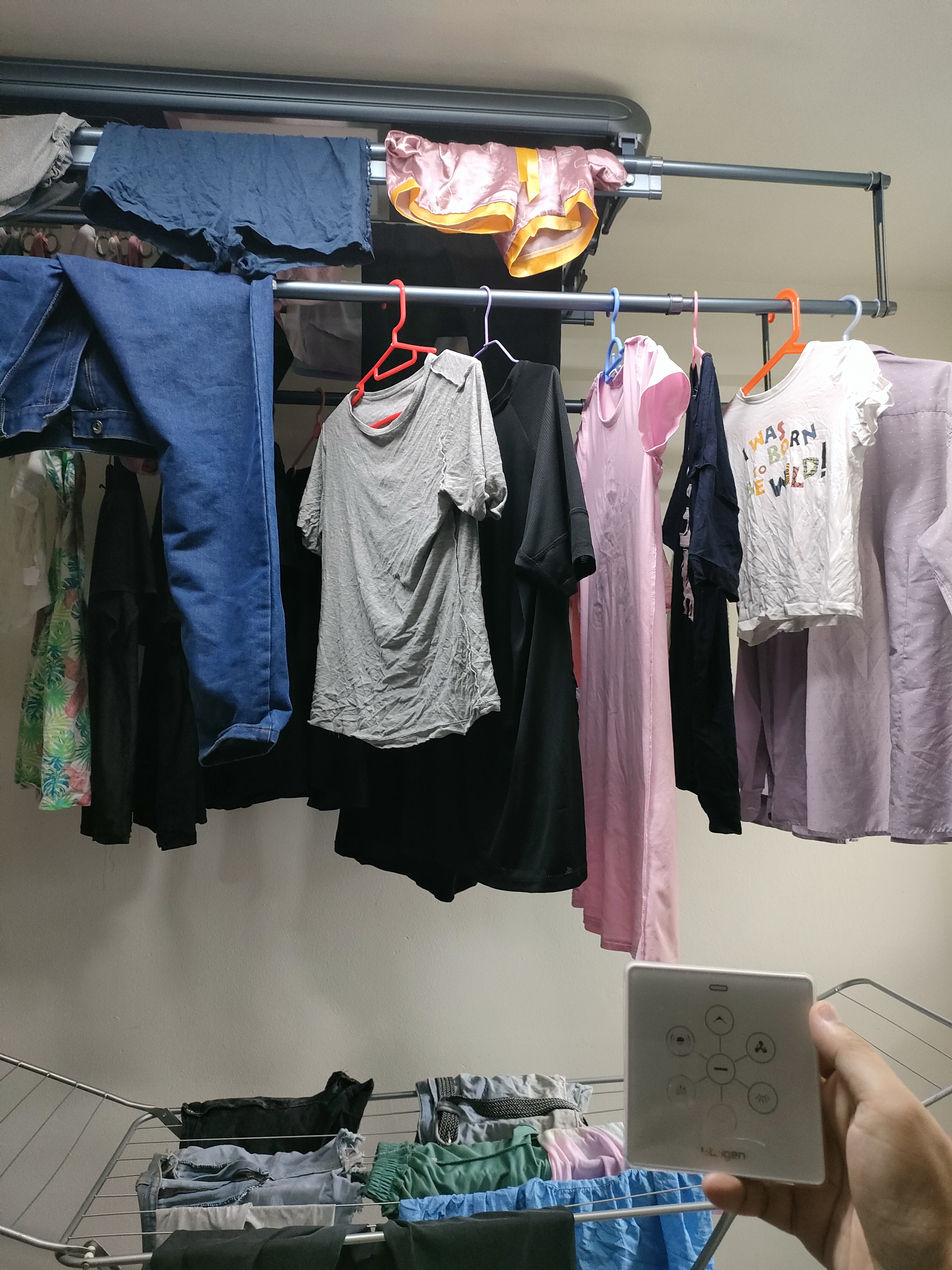 Our HOME has endless LOVE and LAUNDRY.... - Clothes rack, hanging clothes, various garments, wardrobe, clothes hangers
