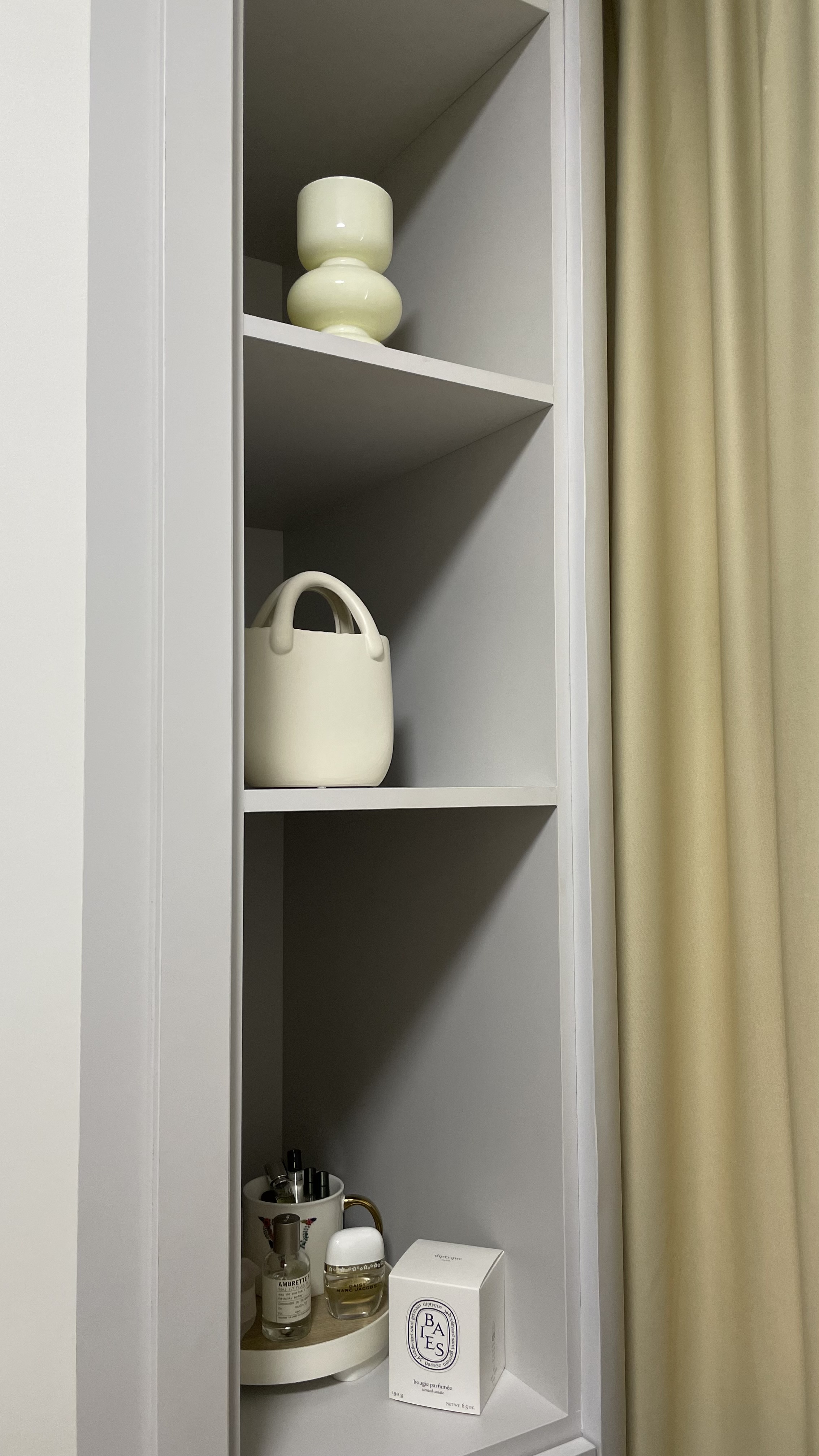 Juzz up your home with affordable aesthetic decor pieces - Shelf with minimalist decor, white shelves, elegant design, modern