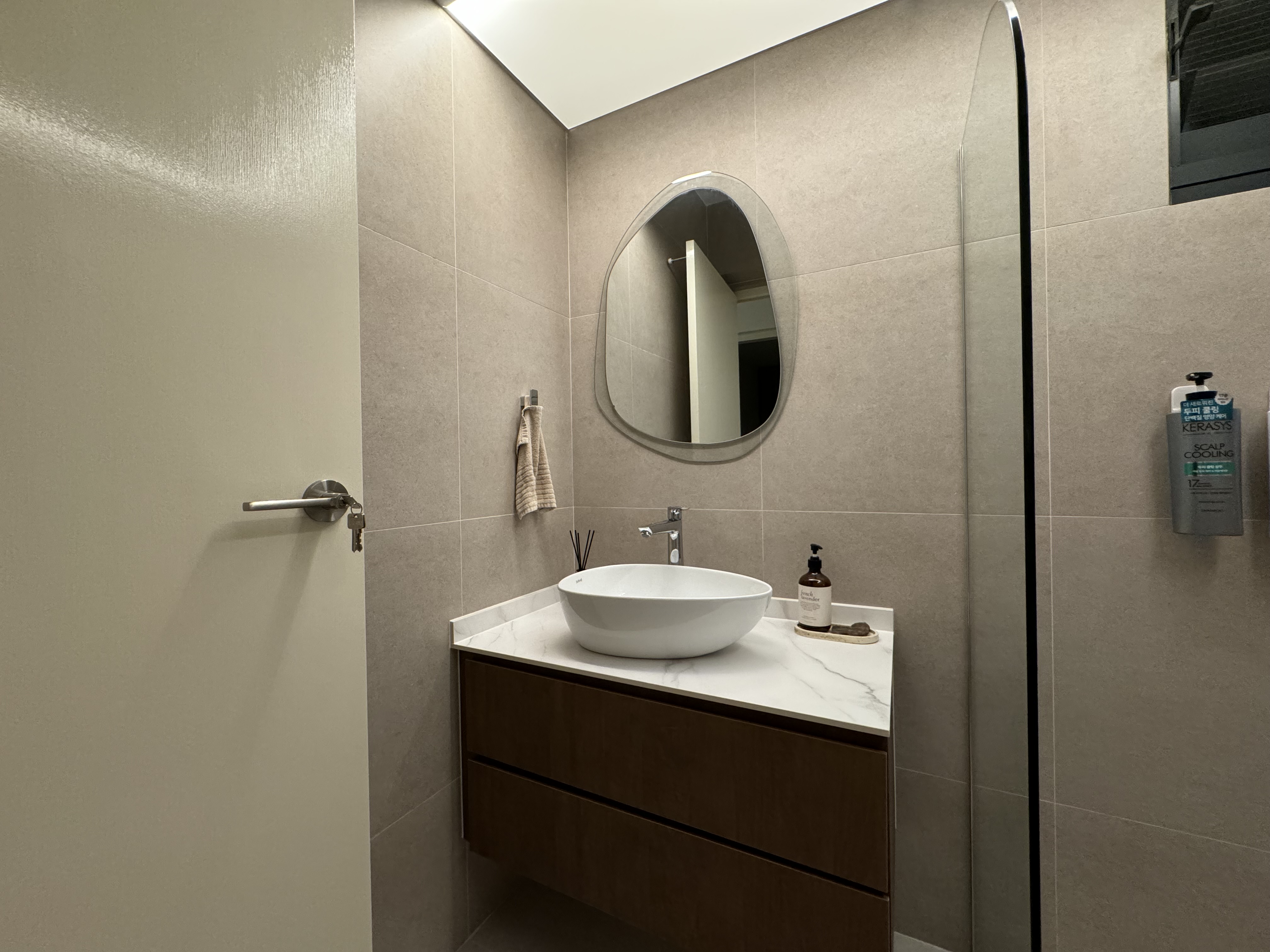 Unveiling our very personal space - bathroom!  - Modern minimalist bathroom, beige tiled walls, round mirror, white pedestal