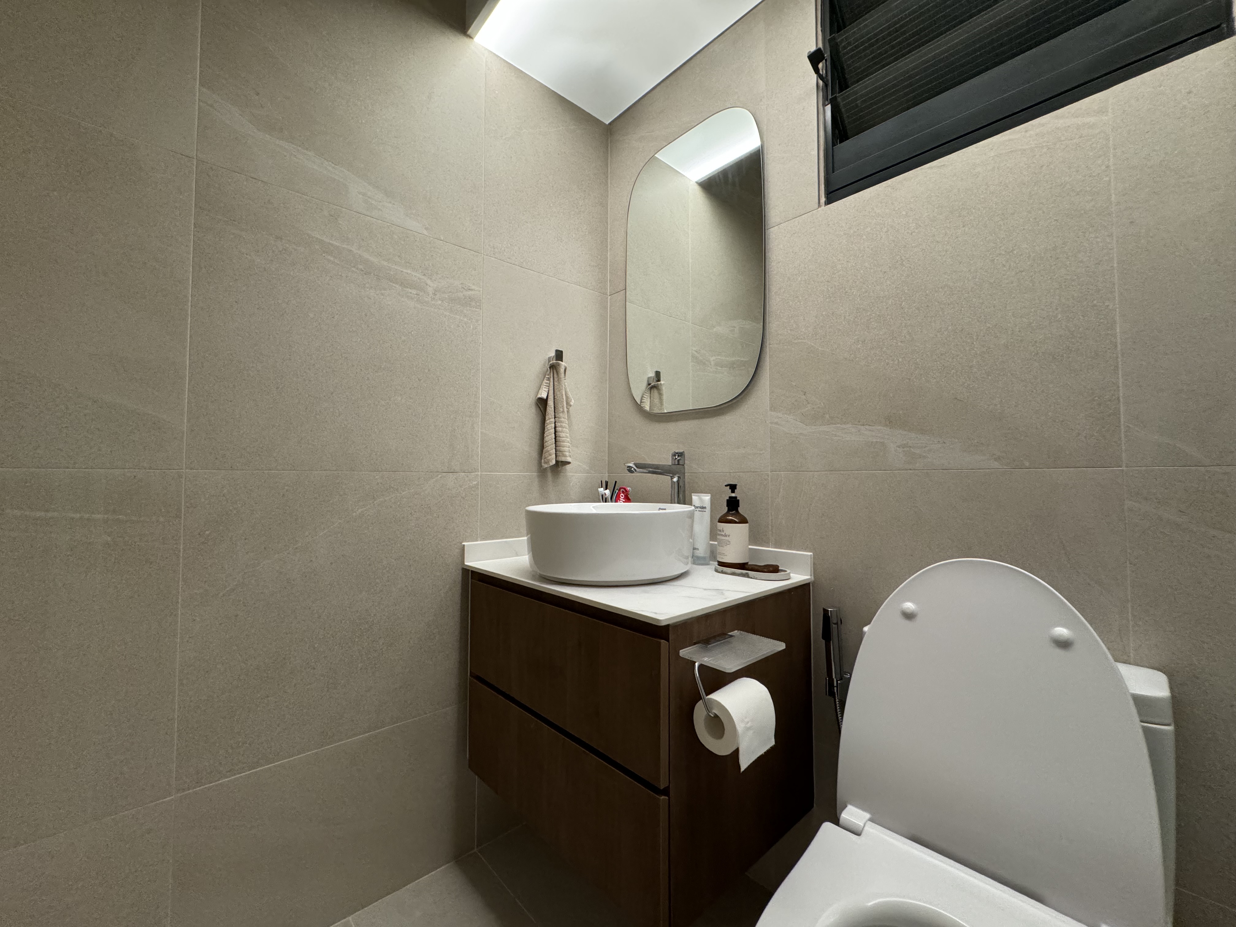 Unveiling our very personal space - bathroom!  - Modern bathroom with beige tiles, sleek vanity with white sink, built-in