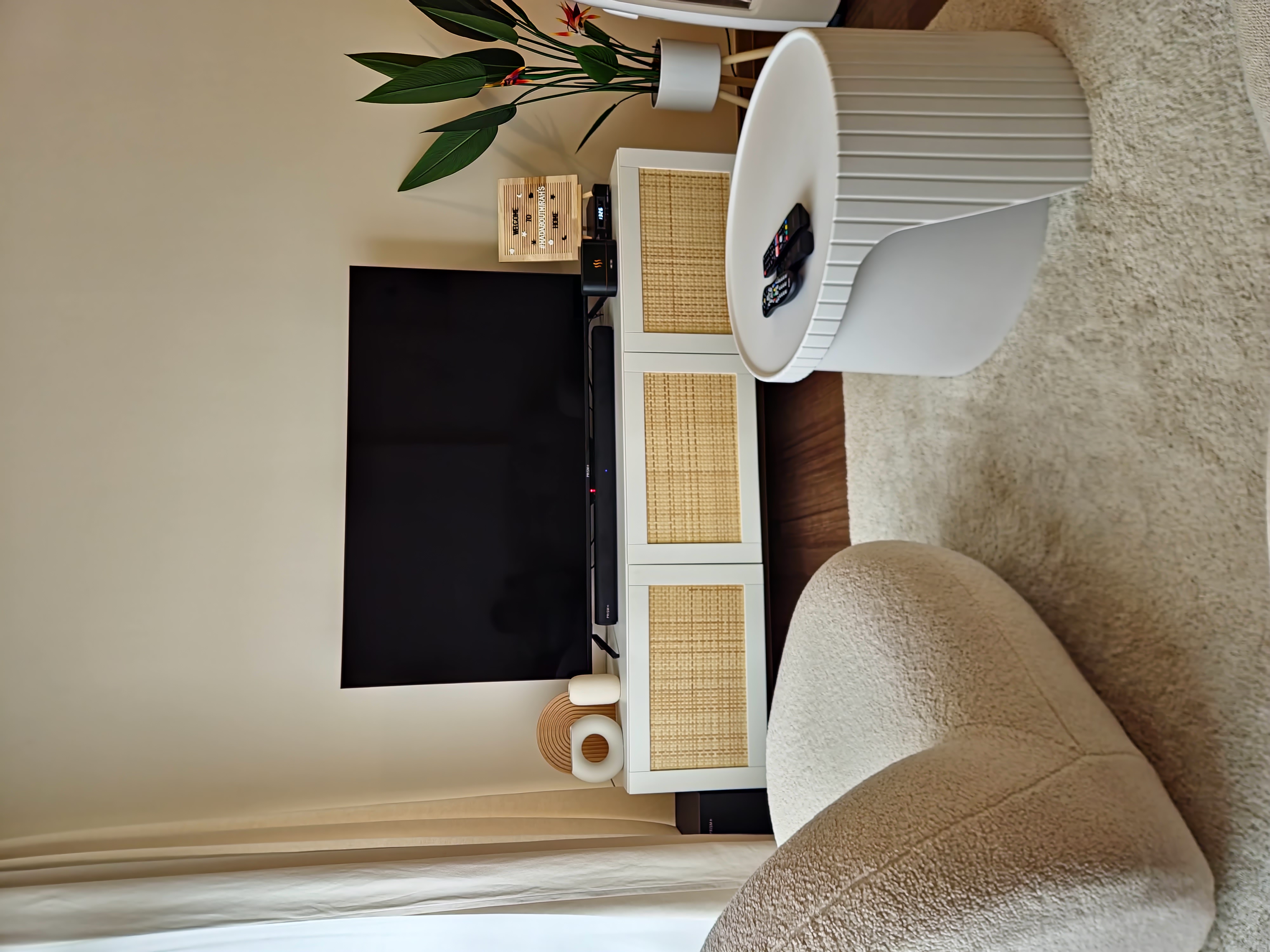 A modern and minimalist living room with scandinavian charm - modern living room decor, minimalist furniture, white and beige