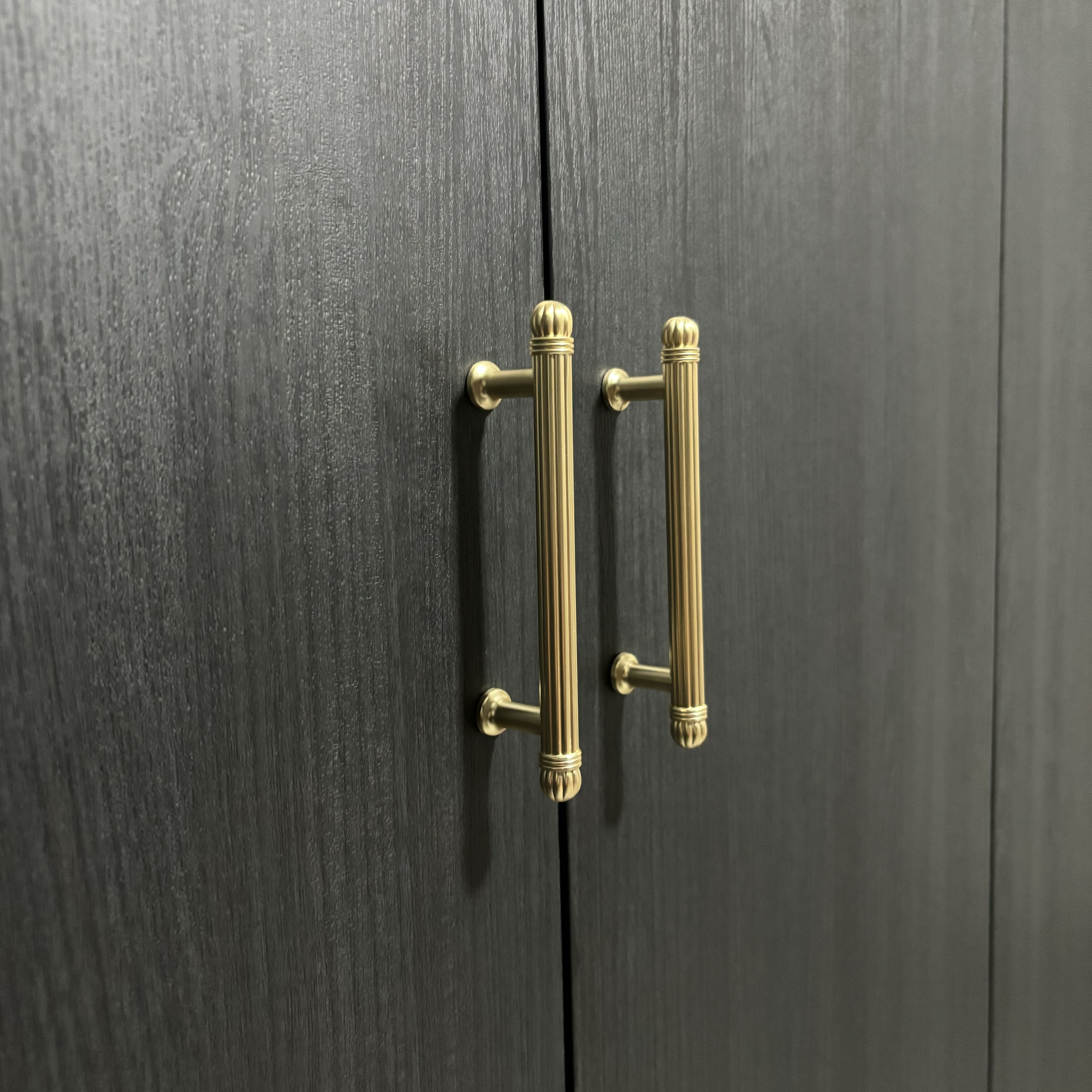 Embrace the dark theme cozy bedroom vibes 🌃 - Gold-toned, elegant, brass handles, sleek design, sophisticated, polished