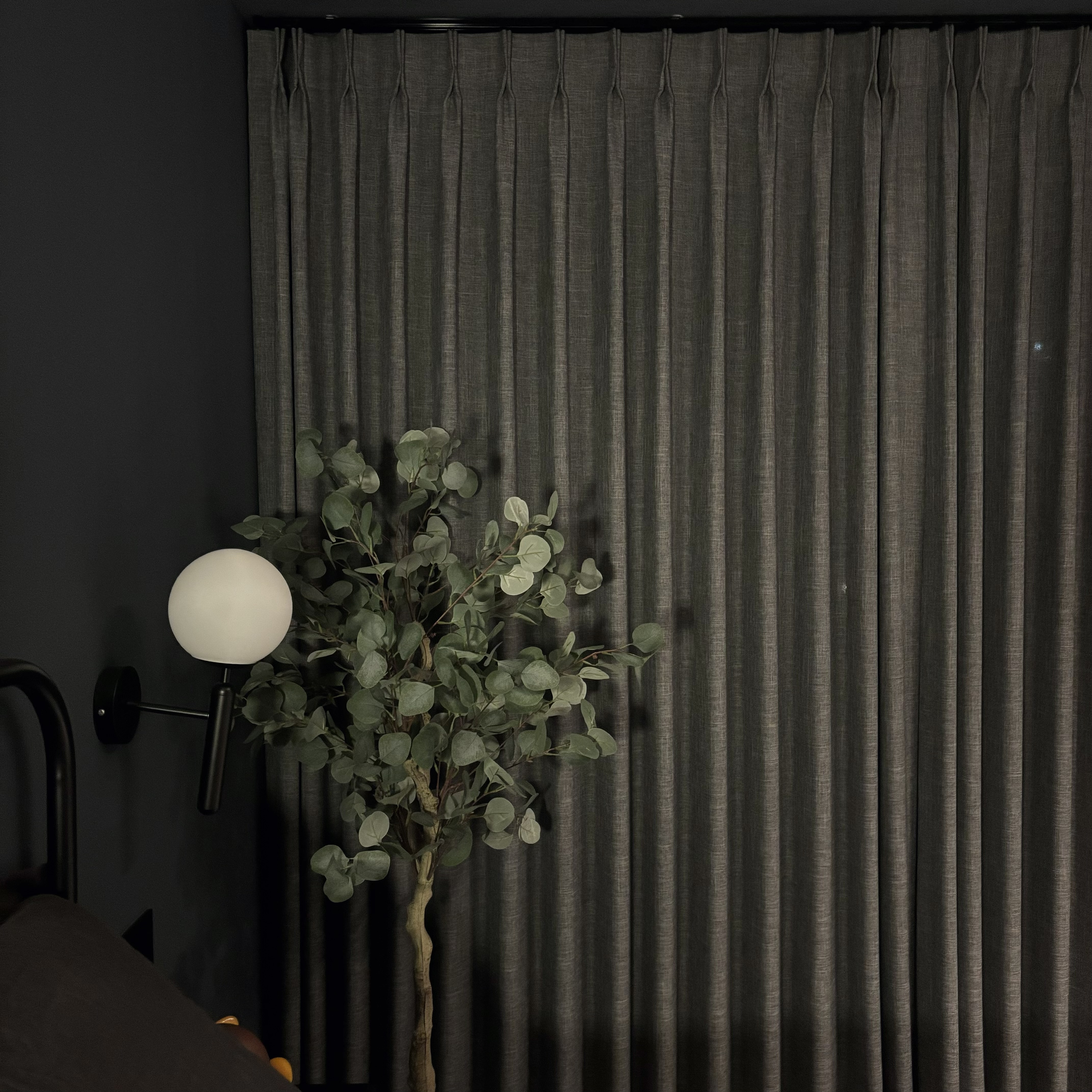 Embrace the dark theme cozy bedroom vibes 🌃 - Dark gray curtains, modern lamp, spherical lampshade, indoor setting, cozy