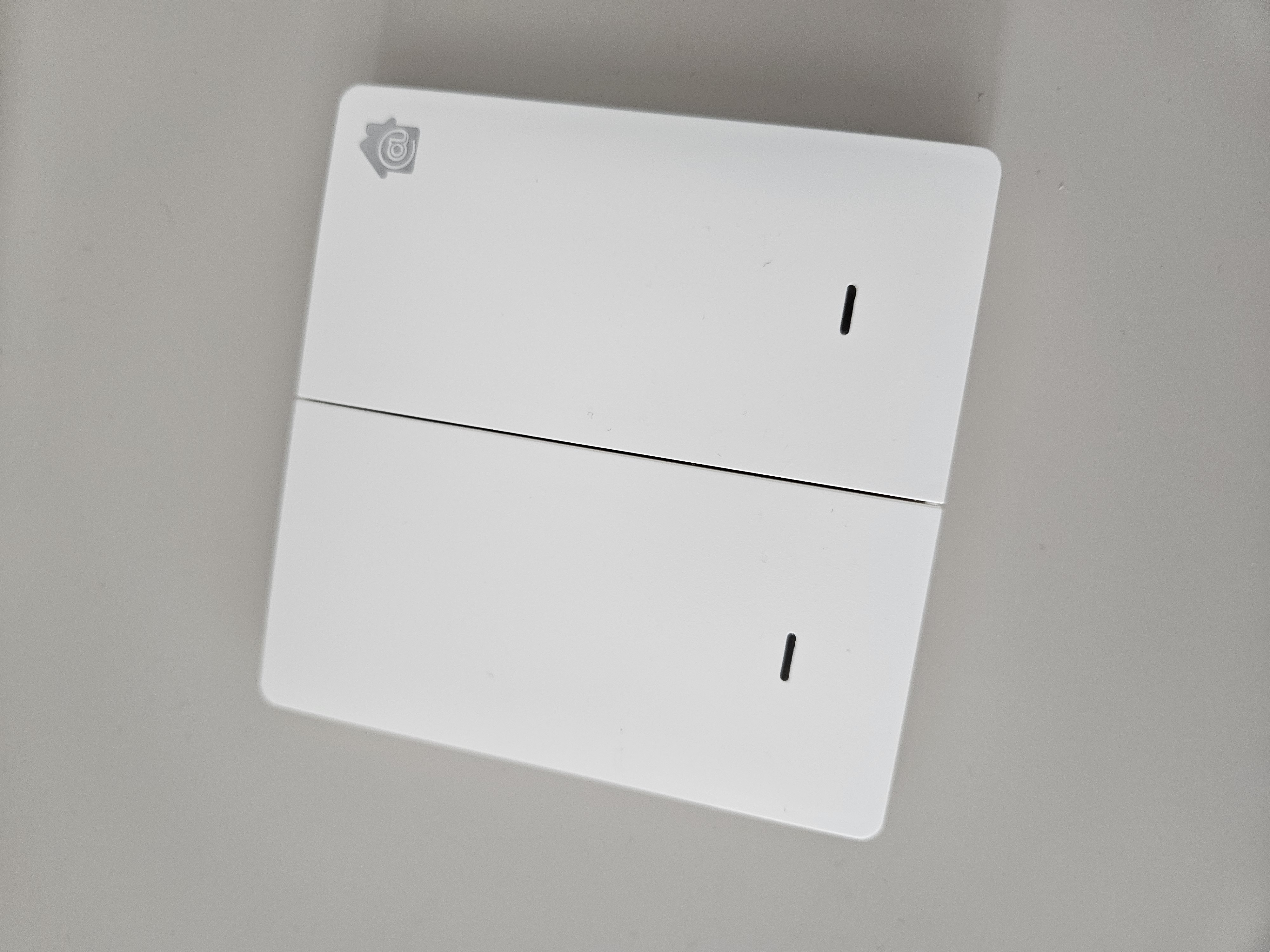 Integrating Smart Devices In Our Home - Sleek, modern design with dual functionality, Minimalist white device with dual