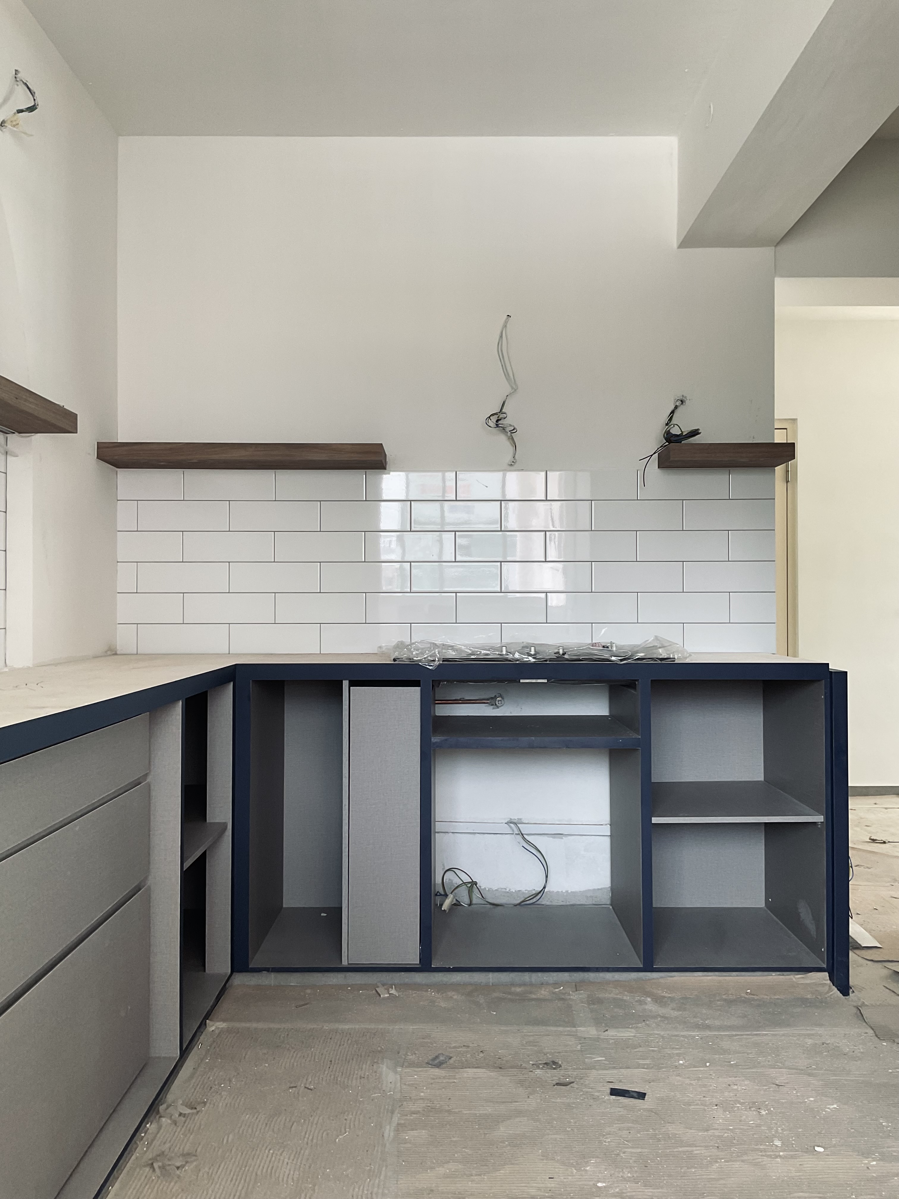 Our blue farmhouse style open concept kitchen!  - modern kitchen cabinetry, under-counter storage, open shelving, minimalist