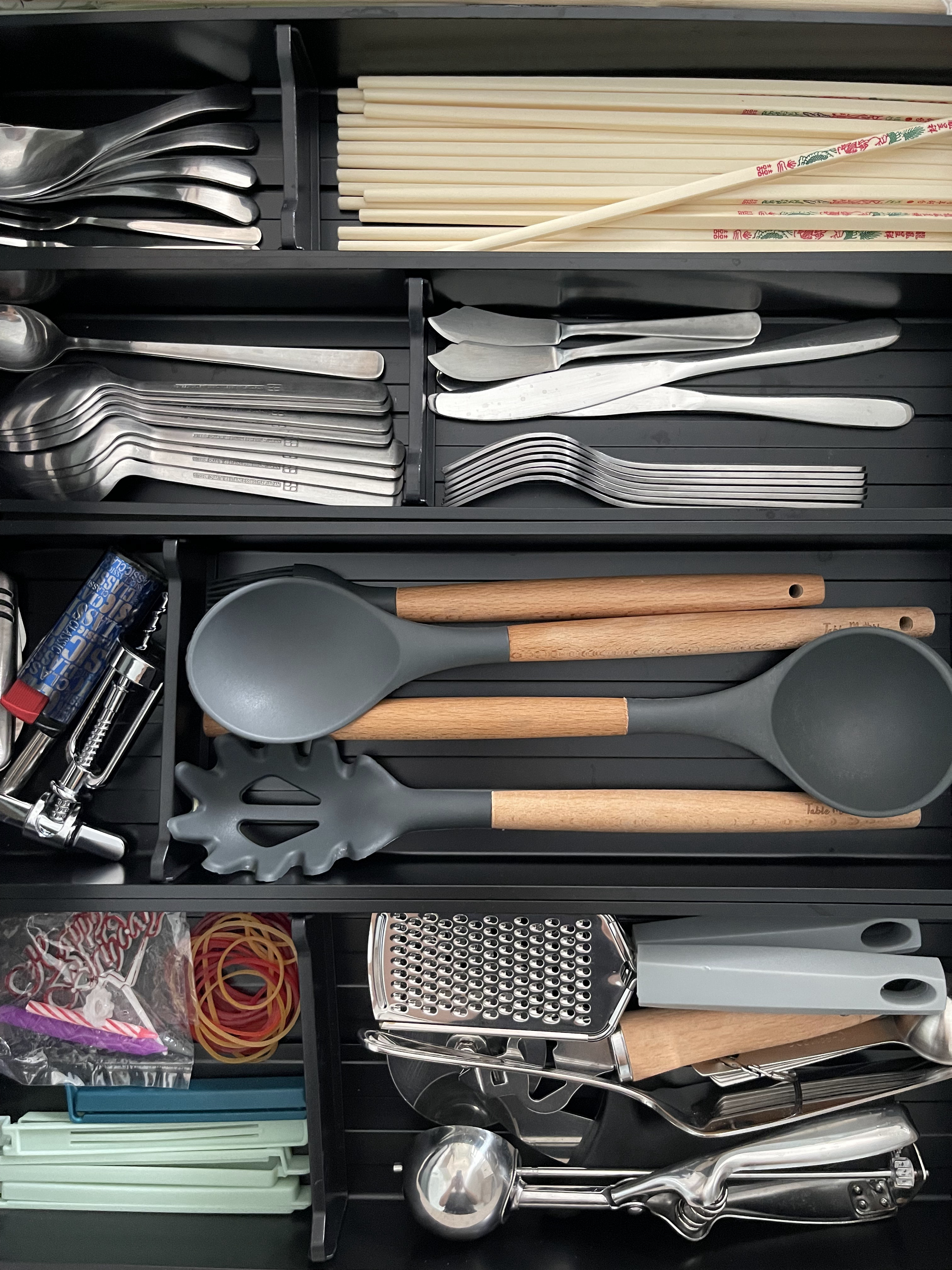 An Open-concept Galley Kitchen + Service Yard - silverware, utensils, kitchen tools, stainless steel, cooking utensils