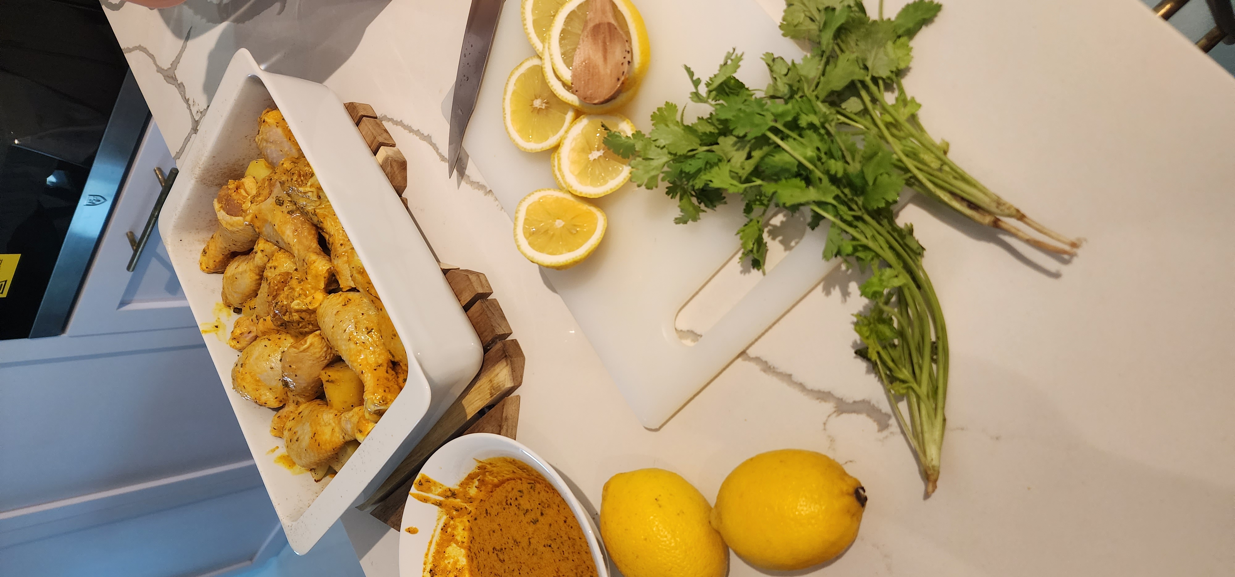 Enjoy your home, you deserve it! - chicken, lemons, parsley, cutting board, knife, fresh herbs, yellow lemon, green herbs