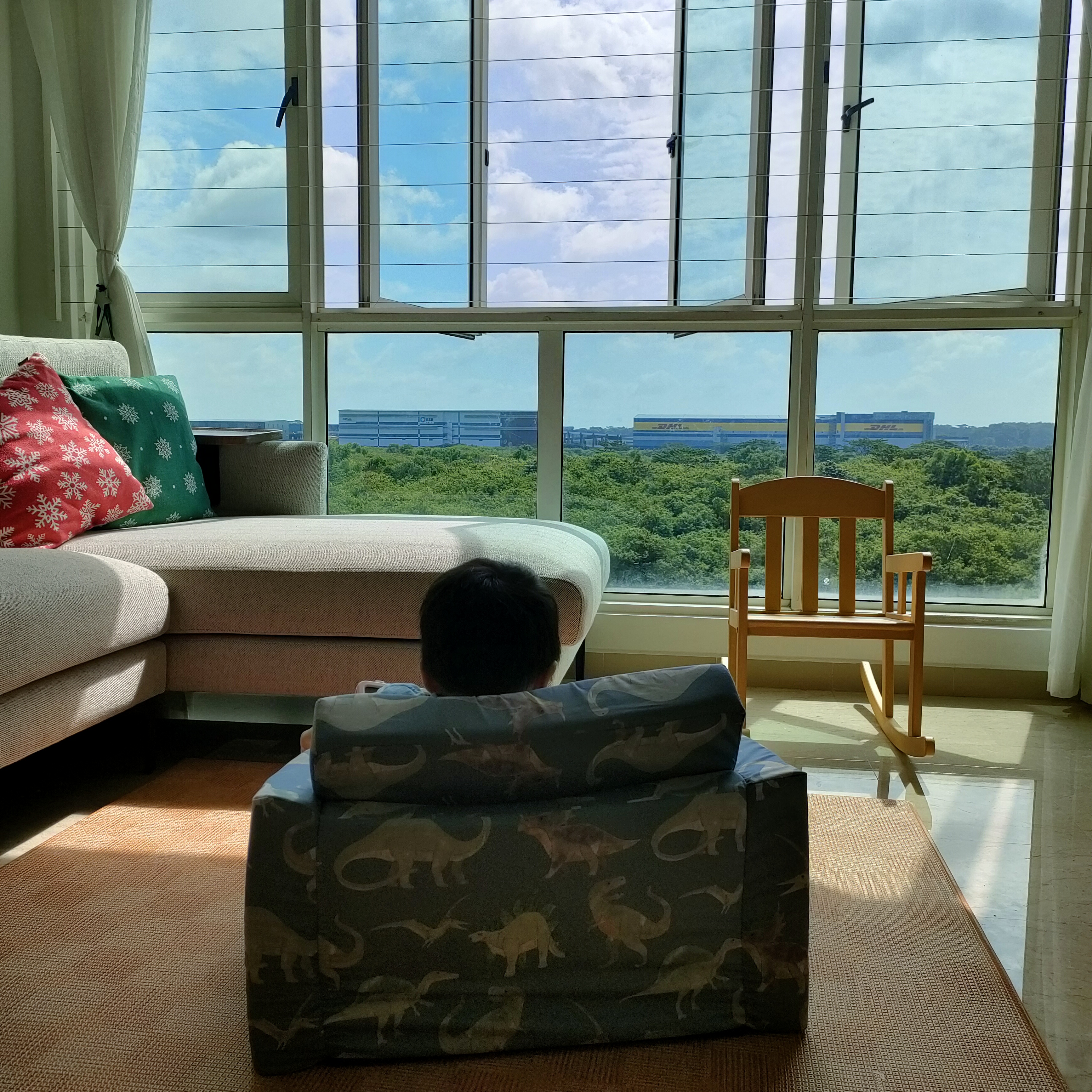 What makes the house our home... - Large windows, bright interior, green trees, blue sky, white curtains, beige sofa, red and