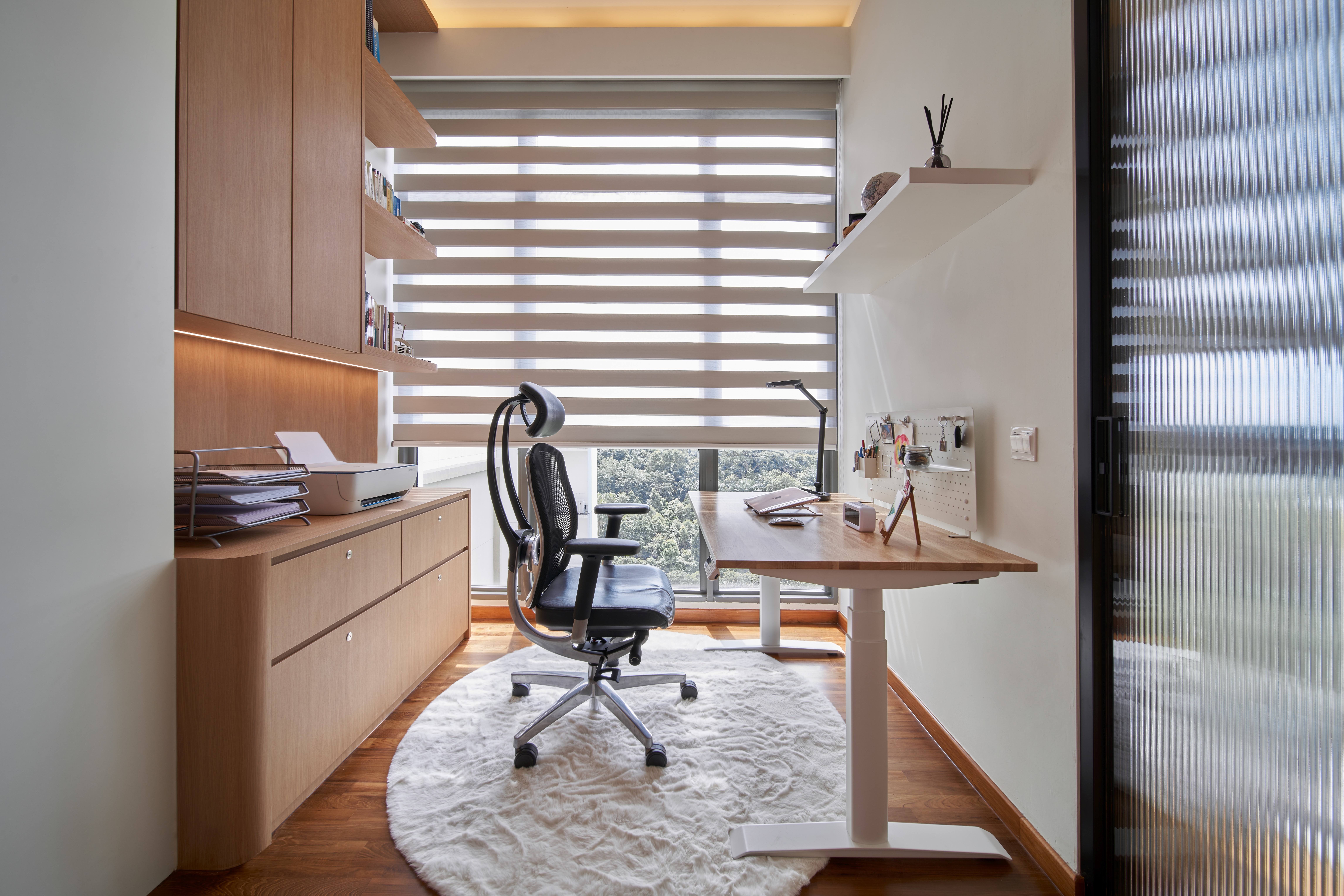 Crafting A Whimsical & Airy Home - Wooden desk, black office chair, large window, blinds, natural light, modern office