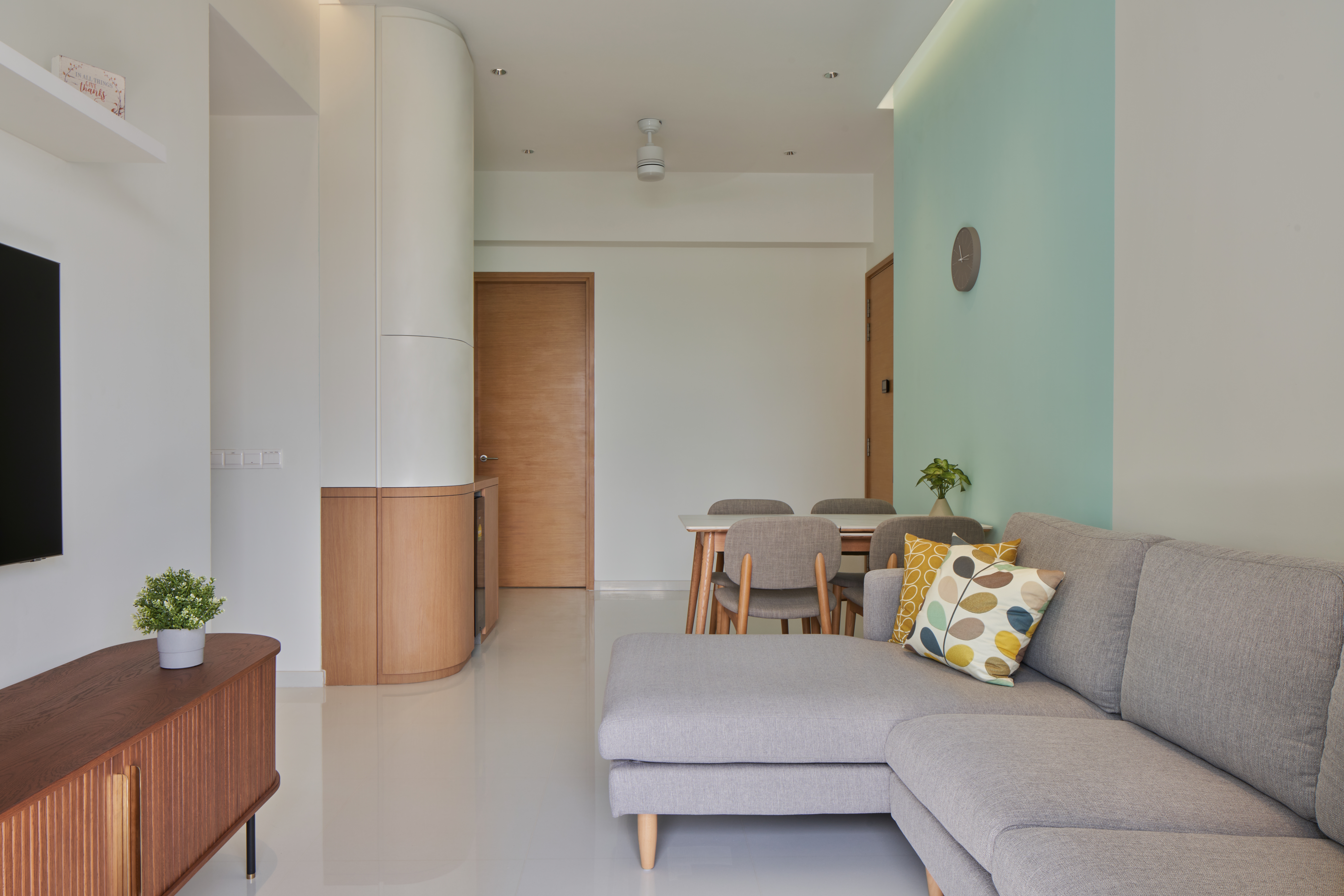 Crafting A Whimsical & Airy Home - Modern living room, minimalist design, clean lines, neutral color palette, large window