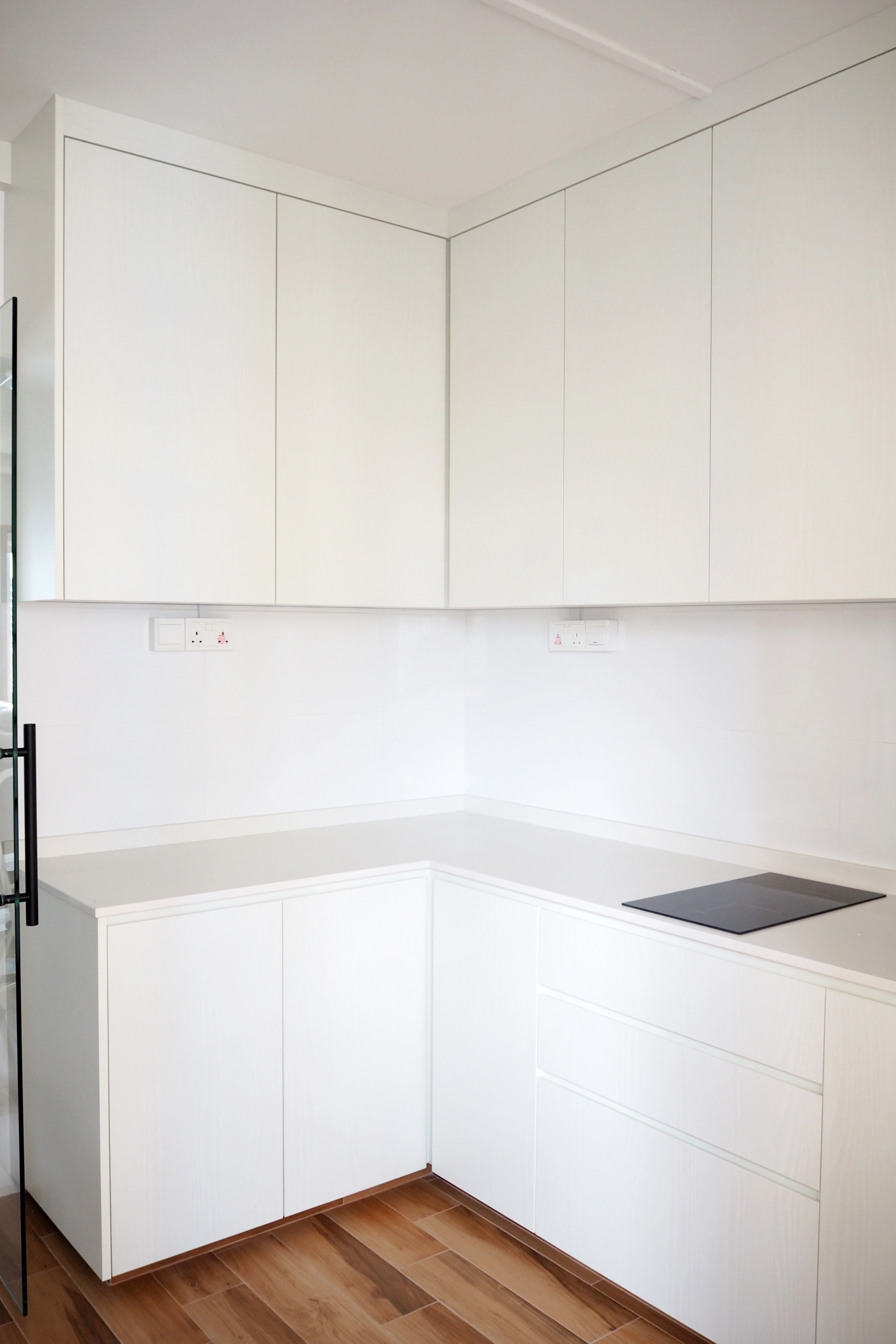 Incorporating minimalistic living into our home - White kitchen cabinets, minimalist design, modern kitchen, sleek cabinetry