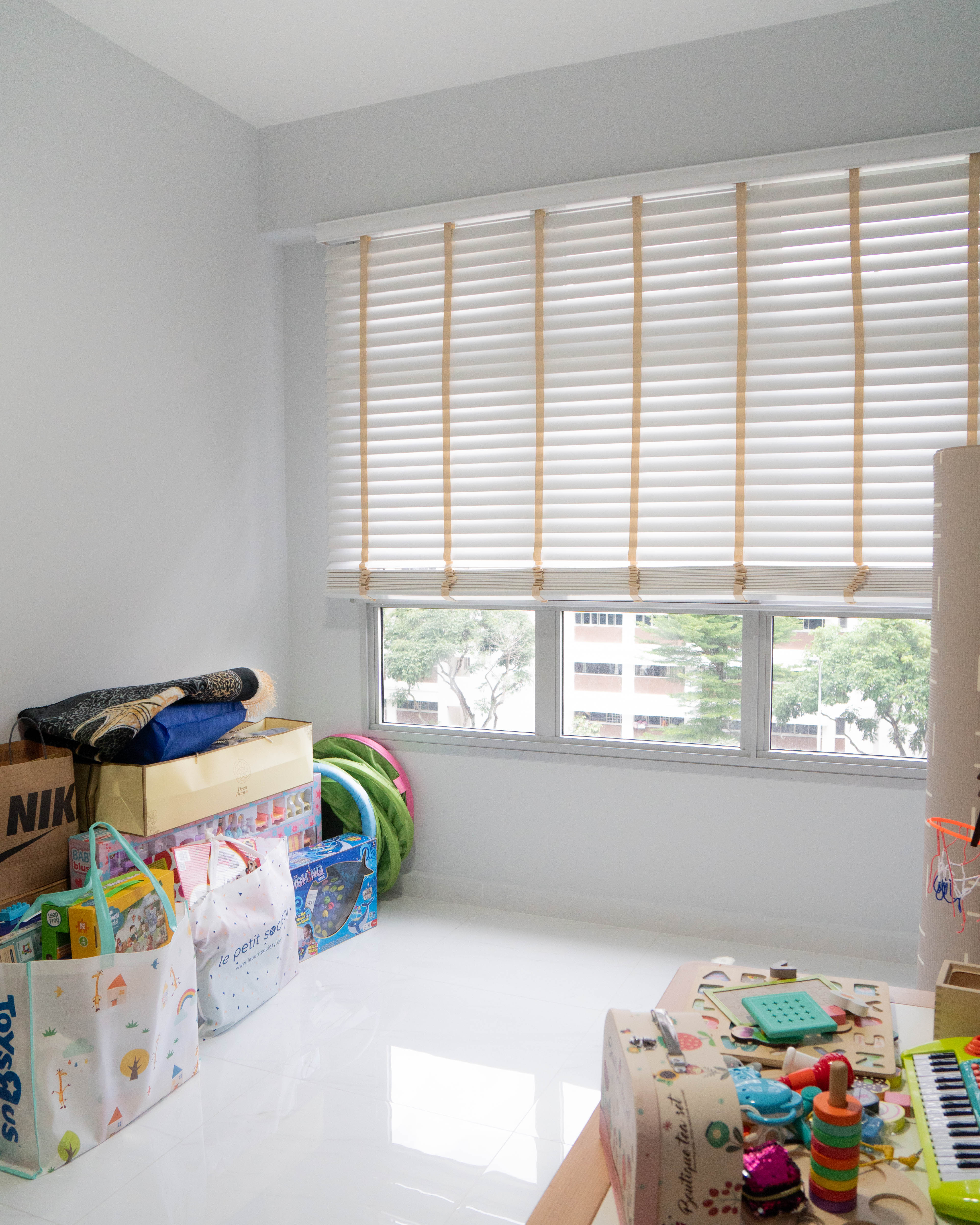 Gender Neutral Kids' Playroom + Girly Dress-Up Room - Children's toys, colorful bags, open book, musical instrument, alphabet