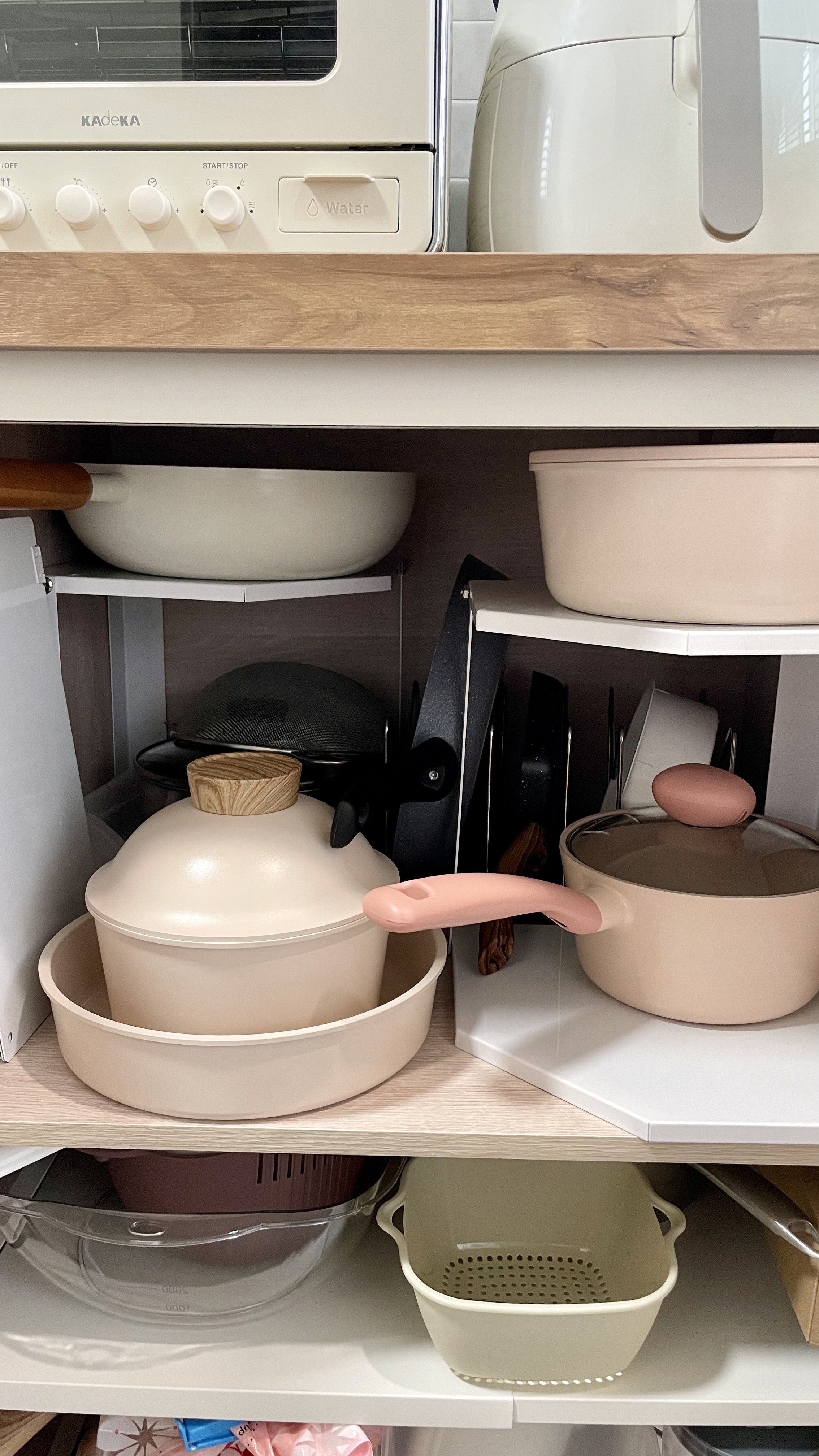 Storage solutions when there’s not enough drawers - White kitchen appliance, Kadeka brand, control knobs, water feature