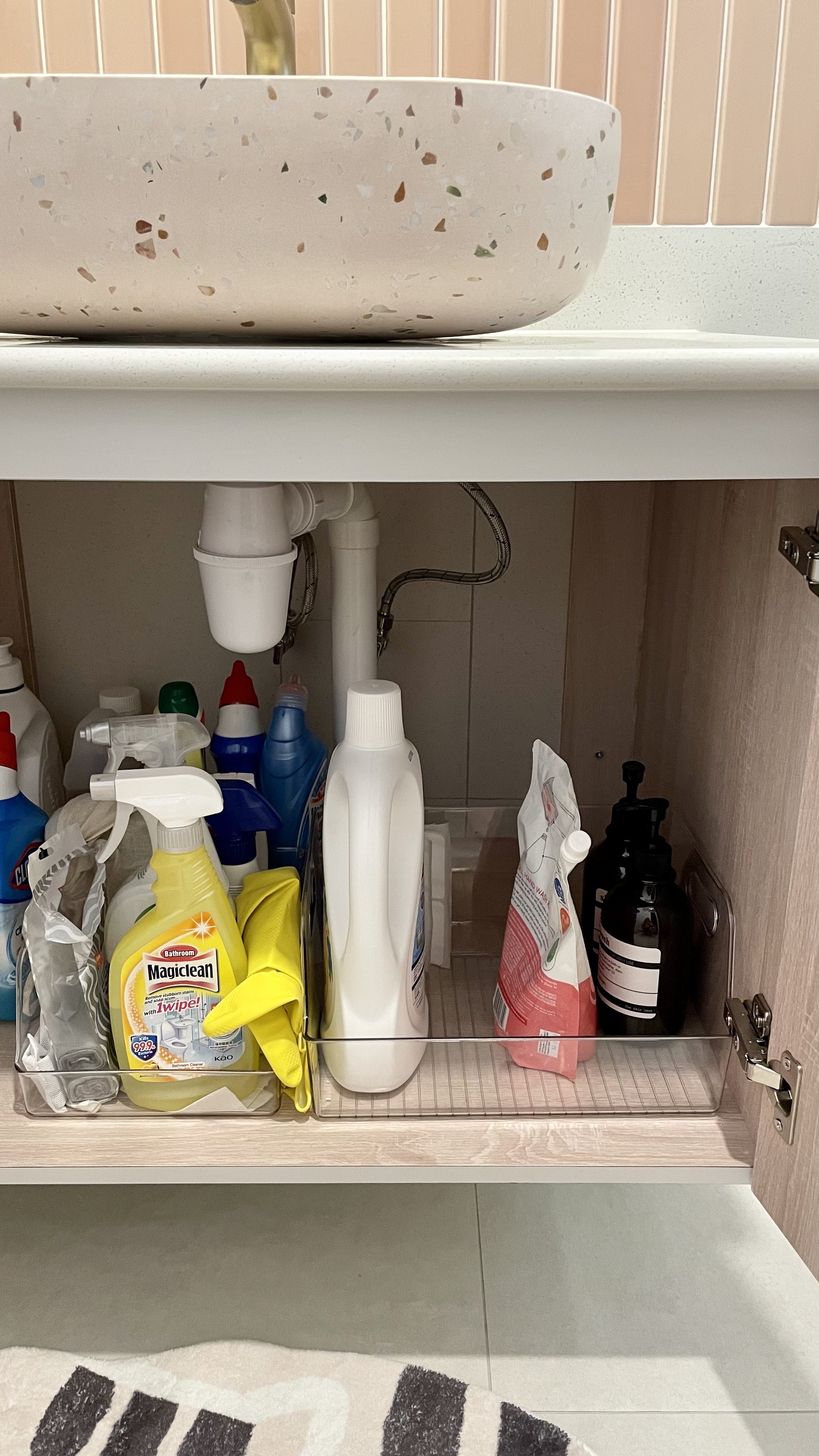 Storage solutions when there’s not enough drawers - Bathroom sink, cleaning supplies, yellow gloves, Magicclean cleaner