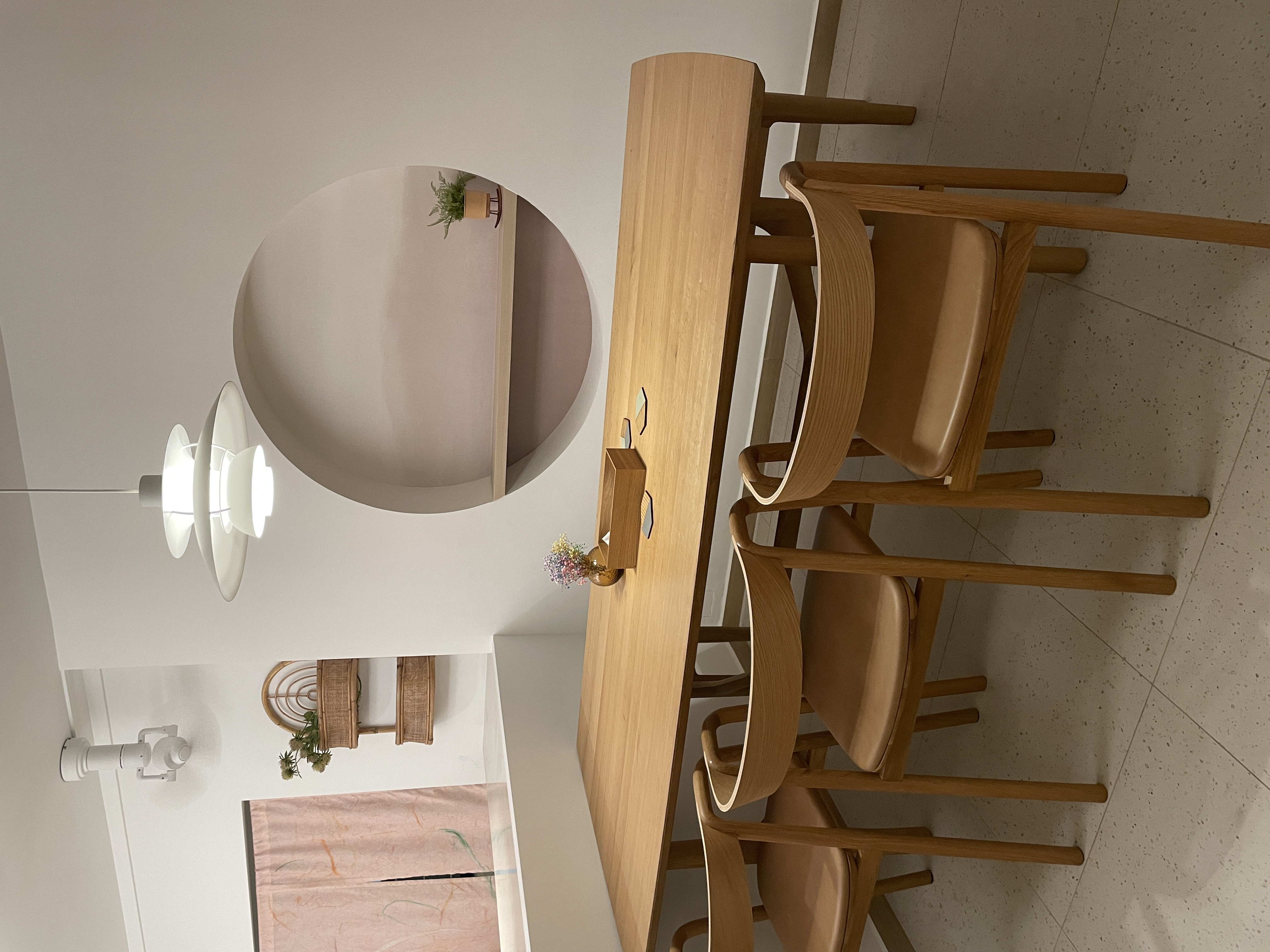 Standout Spots in Our Space - modern dining room, minimalist design, wooden furniture, round table, elegant dining chairs