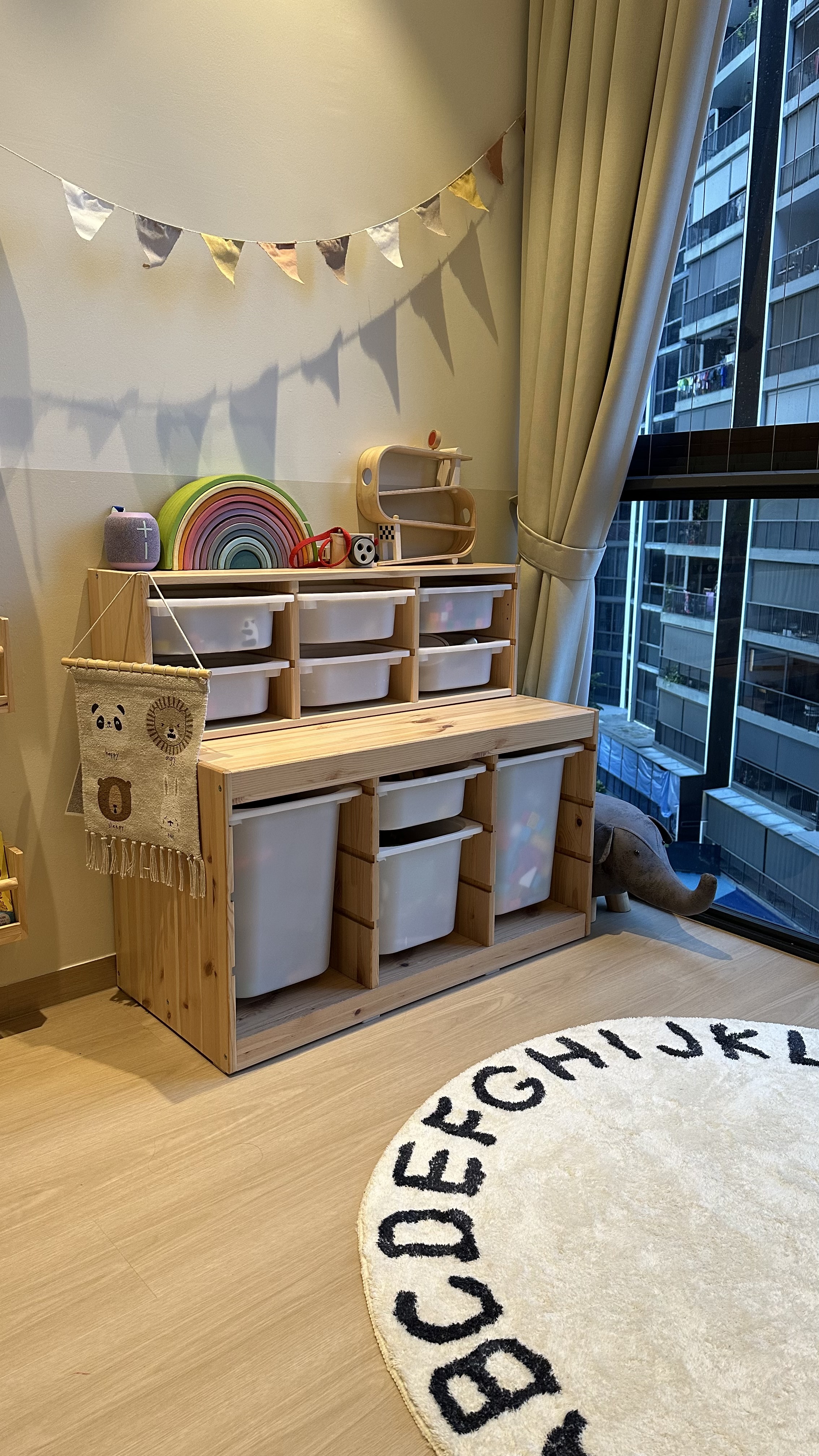 Flexible playroom that will grow with the kids - Wooden playpen with storage bins, colorful rainbow arch, soft toy elephant
