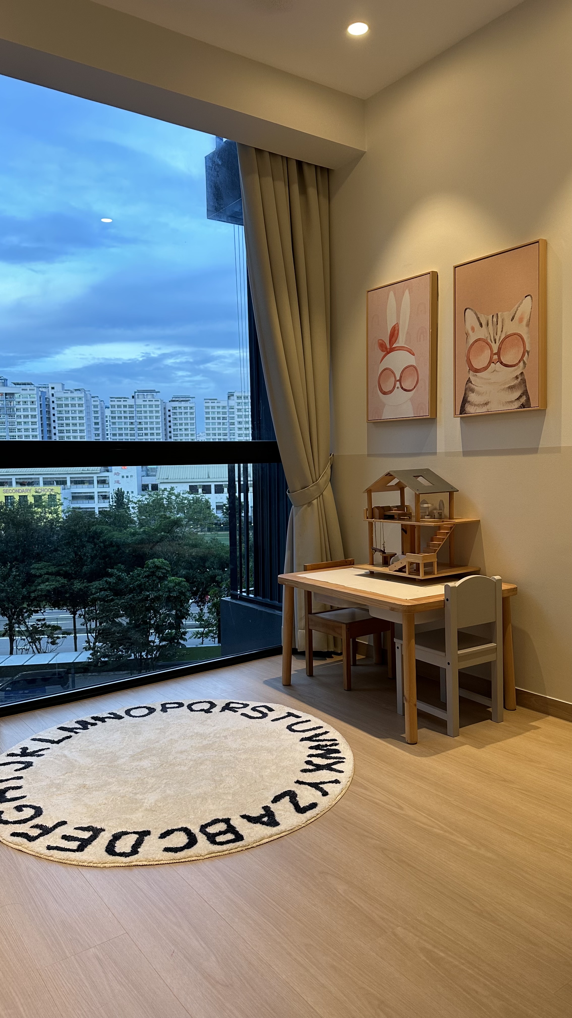 Flexible playroom that will grow with the kids - Modern minimalist room, large window, beige curtains, wooden floor, circular