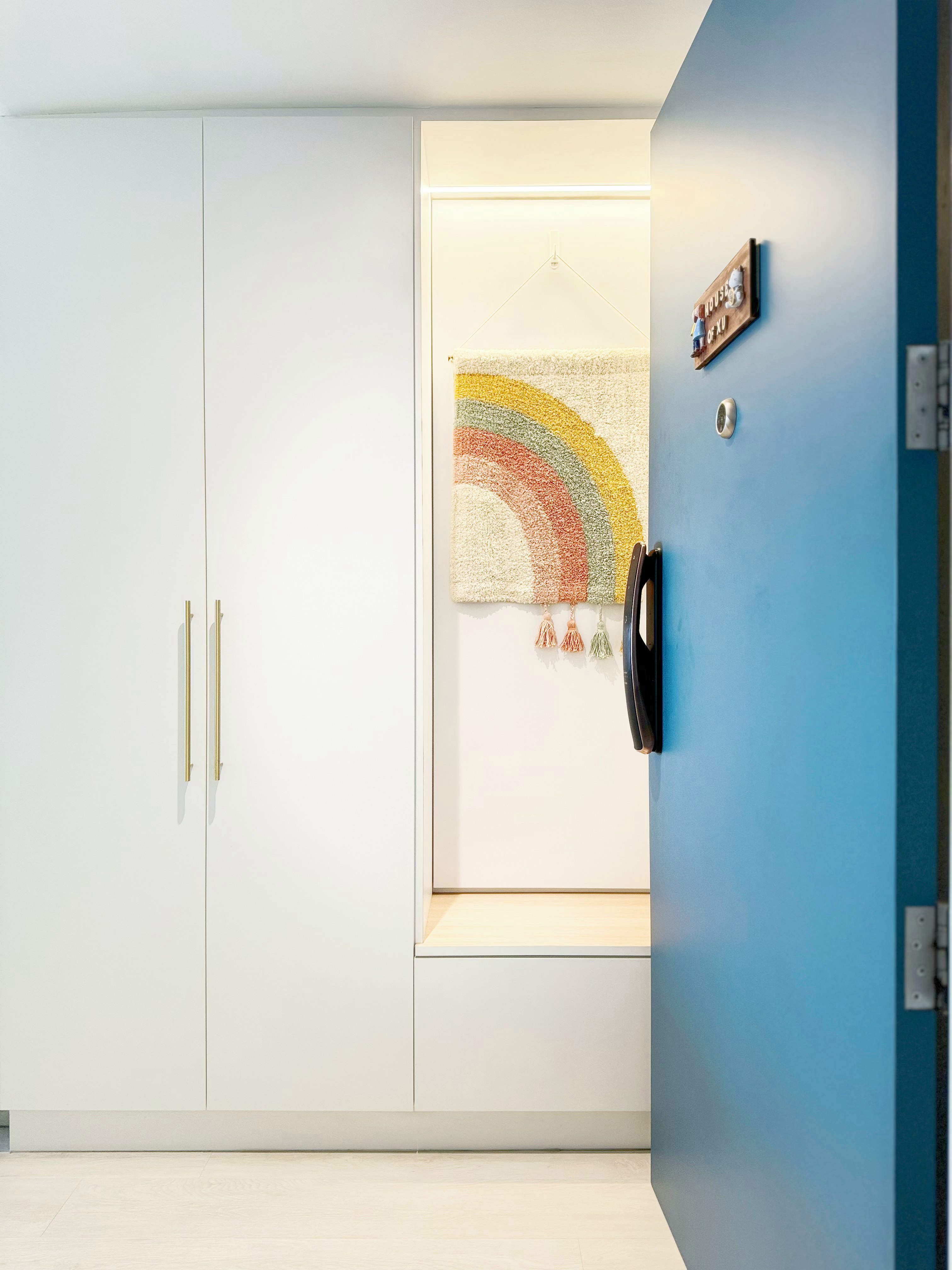 How to Design A Narrow Entryway - White kitchen cabinets, minimalist design, modern aesthetic, light-colored flooring, open