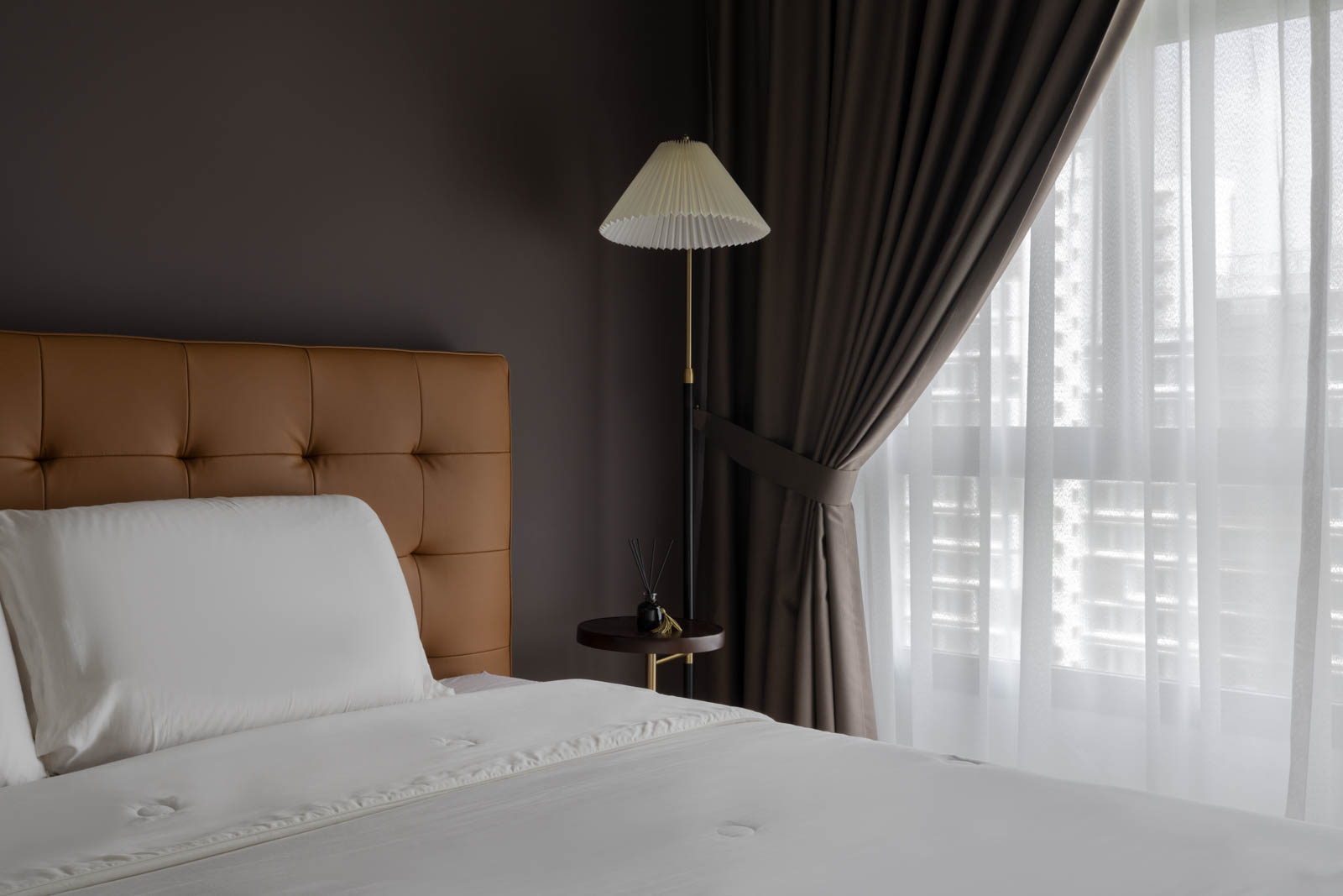 Creating A Modern Country Retreat - Modern bedroom, elegant bed, white bedding, tufted headboard, floor lamp, minimalist