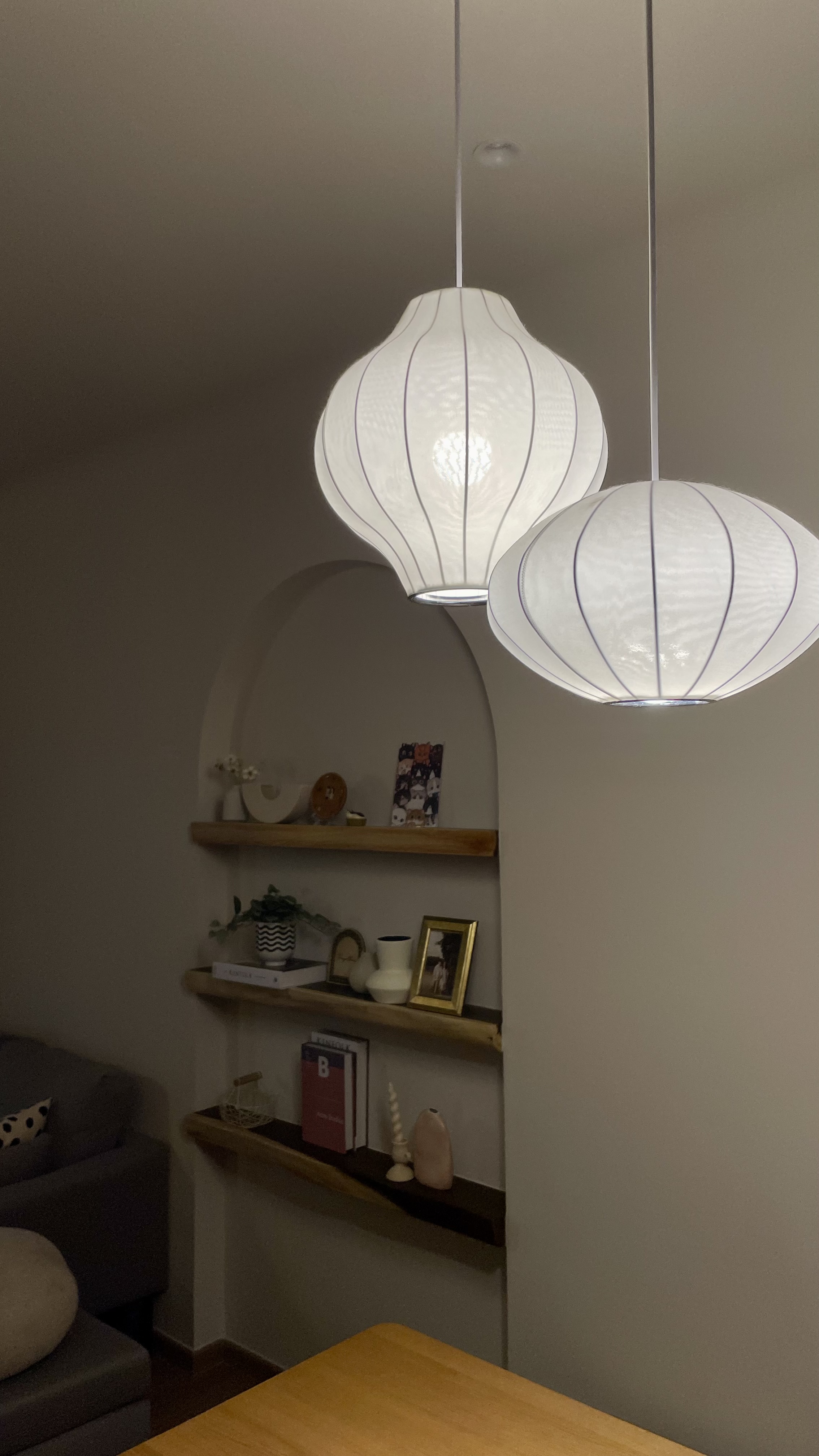 Don’t turn on the big lights 💡 - Modern living room, minimalist decor, white pendant lights, soft ambient lighting, cozy