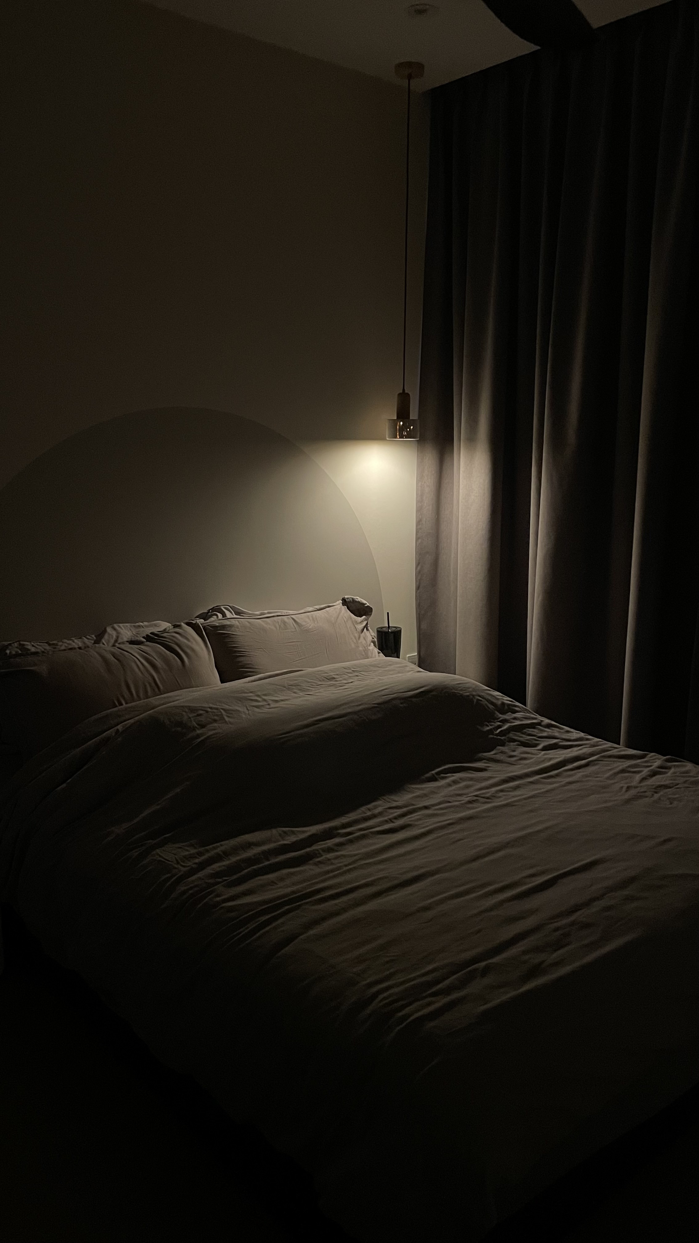 Don’t turn on the big lights 💡 - dimly lit bedroom, cozy atmosphere, soft lighting, bedside lamp, nightstand, neatly made