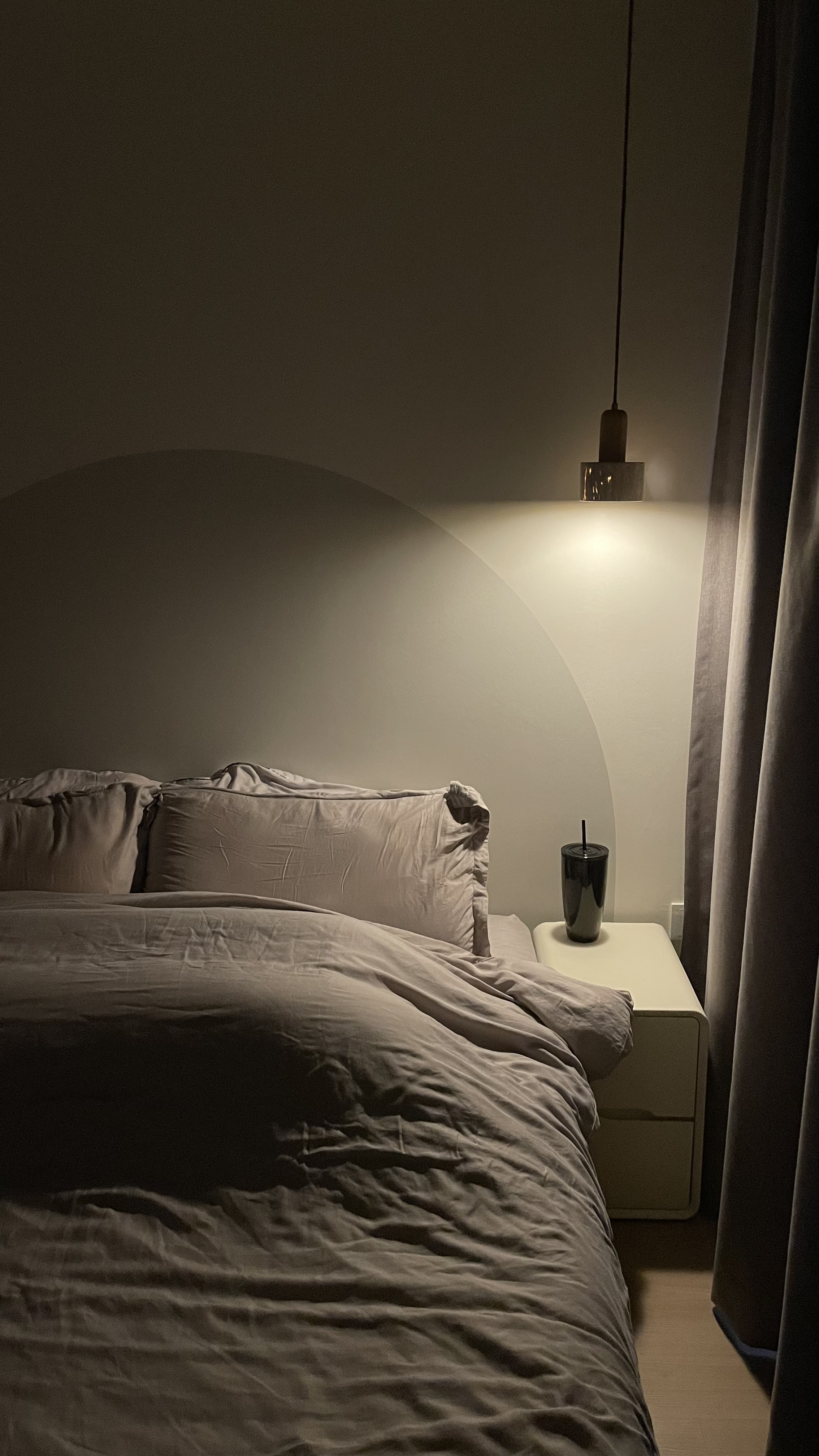 Don’t turn on the big lights 💡 - dimly lit bedroom, cozy atmosphere, soft lighting, bedside table, modern decor, neutral