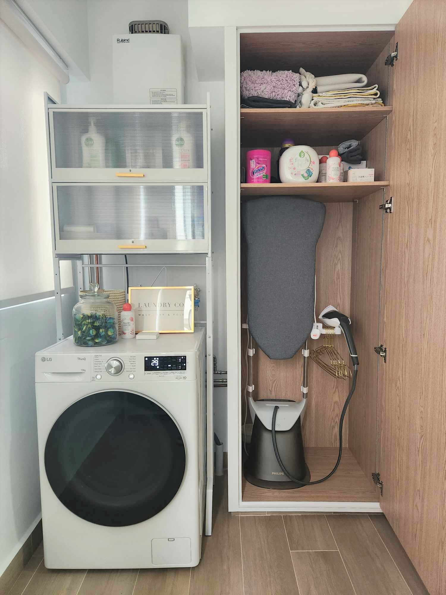 Our laundry space  - Washing machine, dryer, and iron combo, LG washing machine, 10-liter water tank, built-in dryer, wooden
