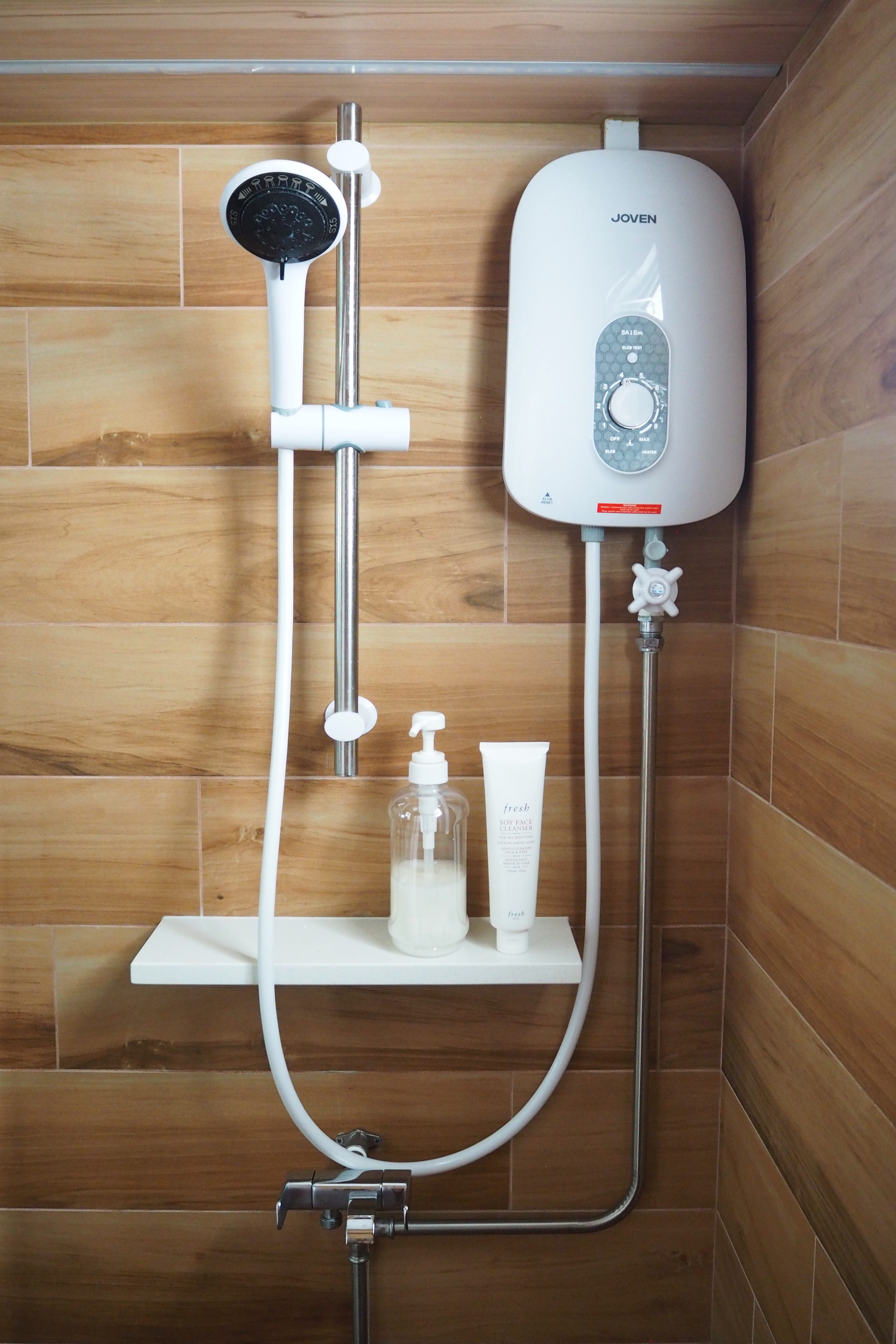 A how-to guide: Maximising limited space at home - shower unit, white Joven, handheld showerhead, bidet, soap dispenser