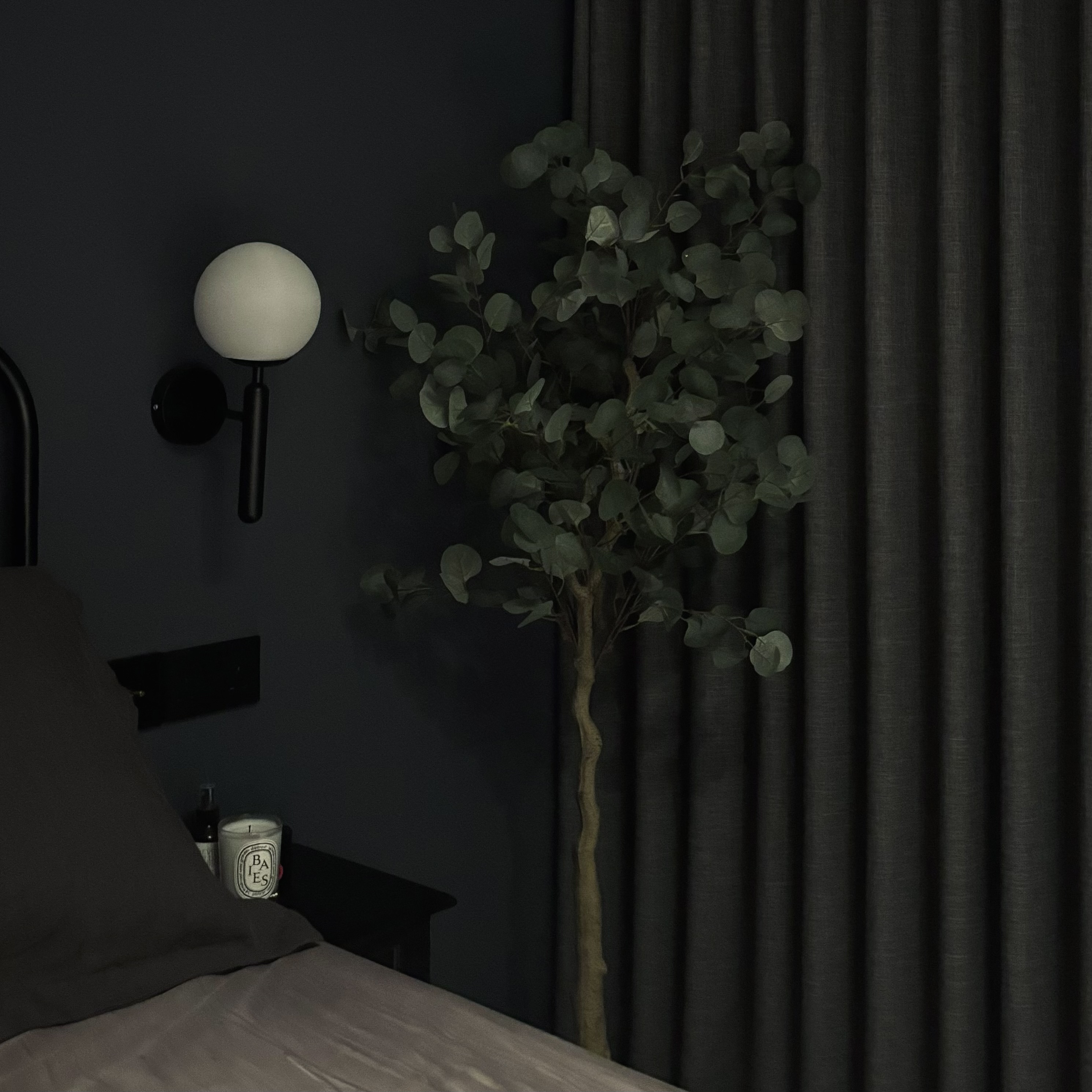 Elevating our home effortlessly with faux plants 🍃🌿 - dark, minimalist, modern, cozy, dimly lit, nightstand, black wall