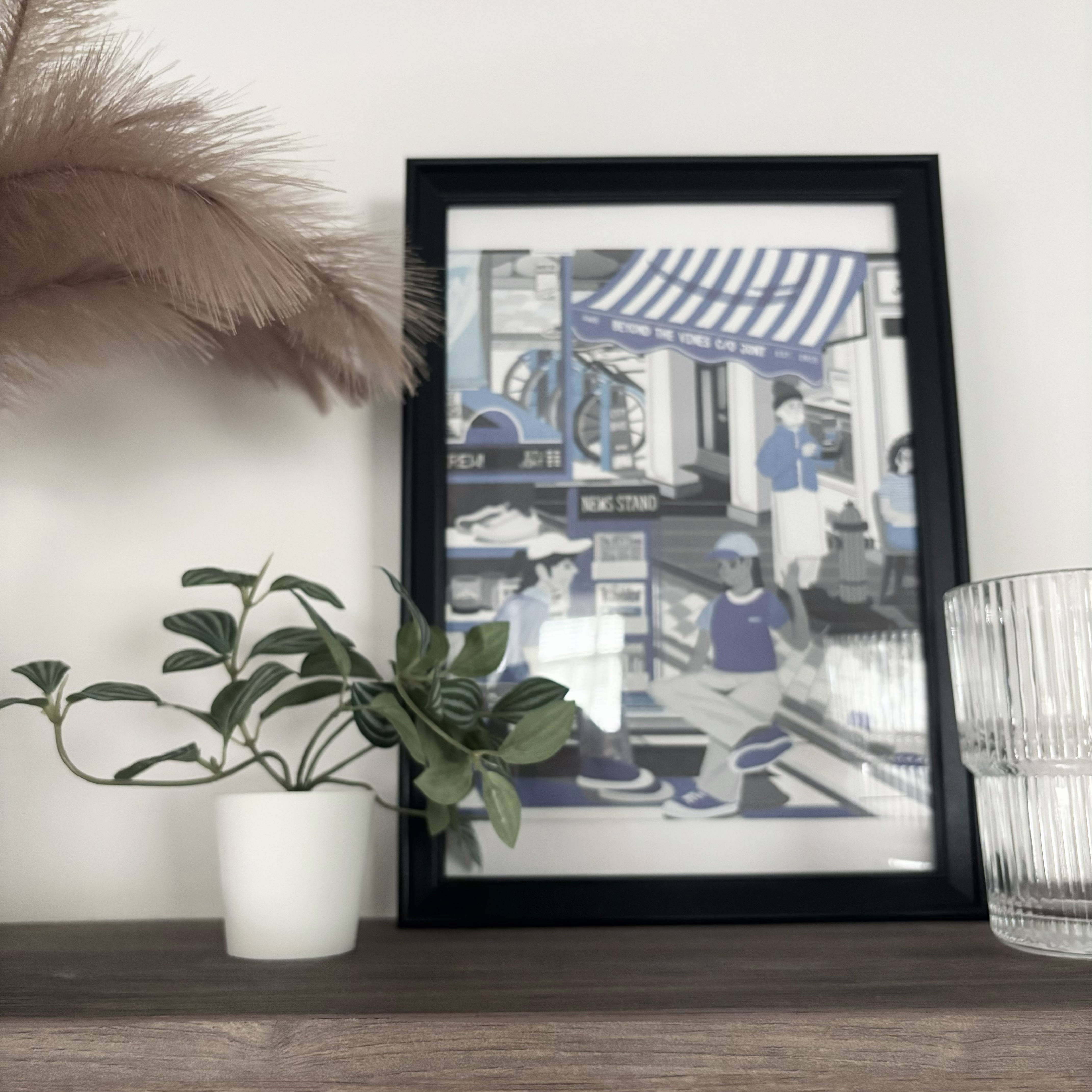 Elevating our home effortlessly with faux plants 🍃🌿 - Framed illustration, blue and white color scheme, indoor setting
