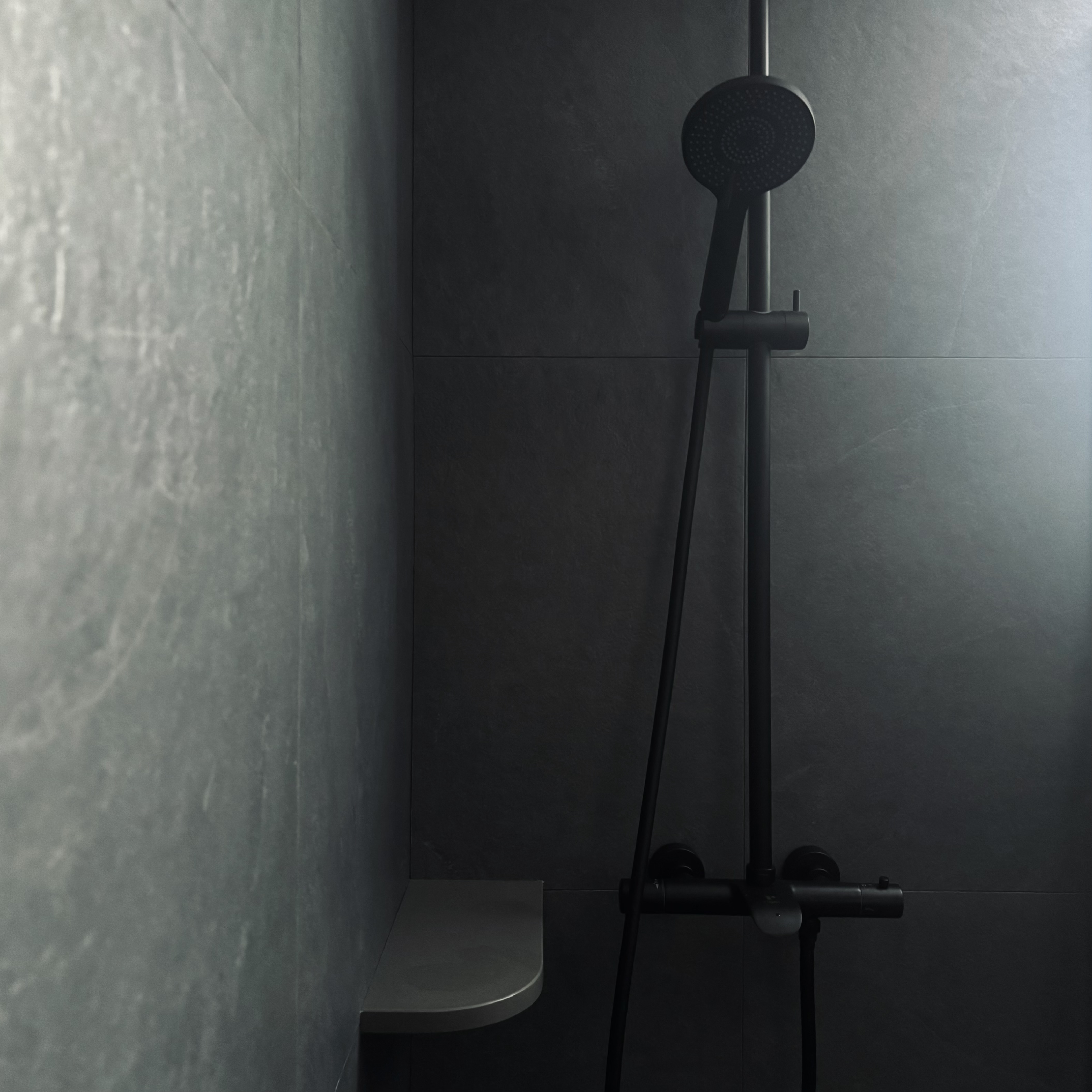 Two toilets, two different themes ✨ - Modern minimalist shower stall, sleek black showerhead, matte gray walls, low-lying