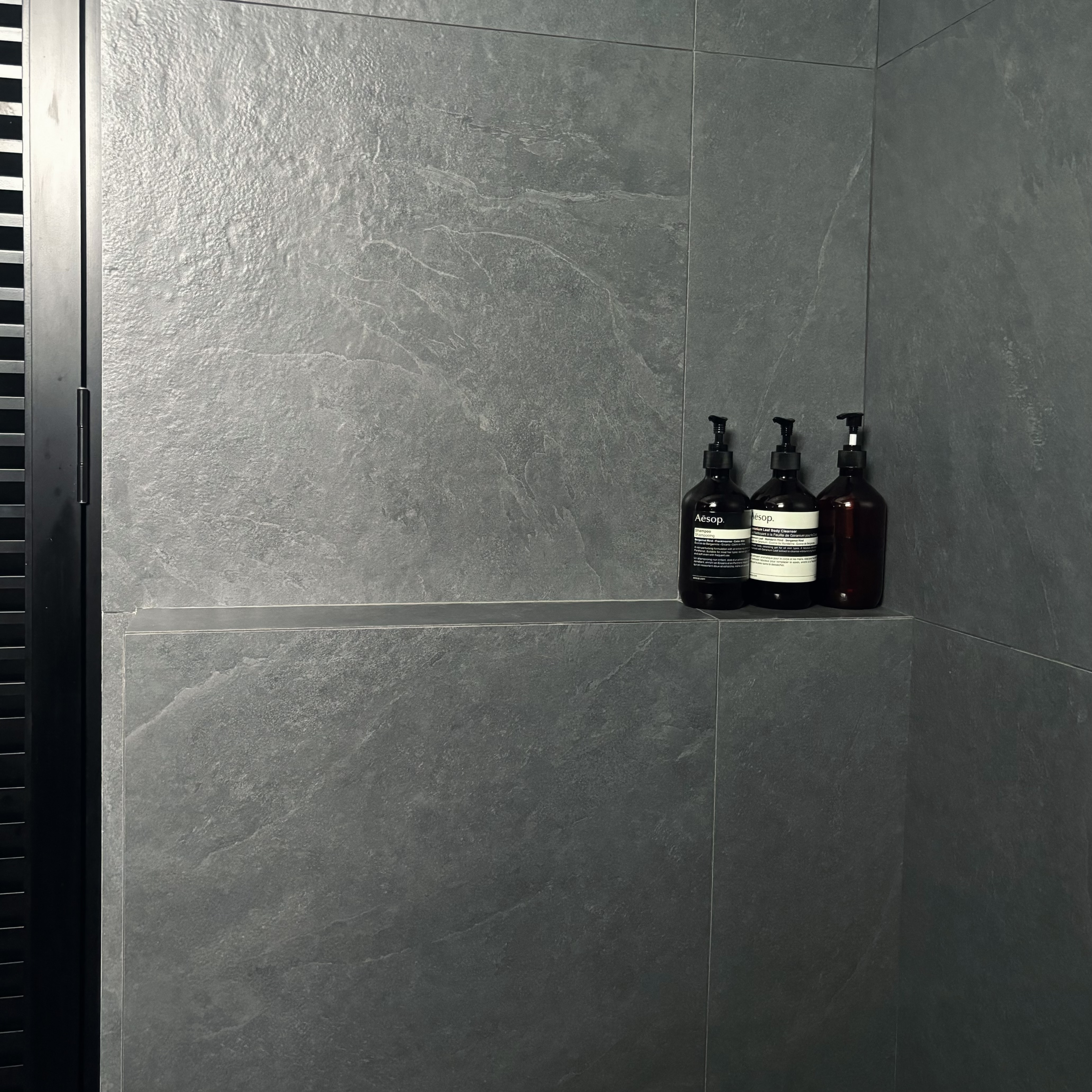 Two toilets, two different themes ✨ - Grey marble tiles, modern bathroom, sleek design, minimalist decor, sophisticated