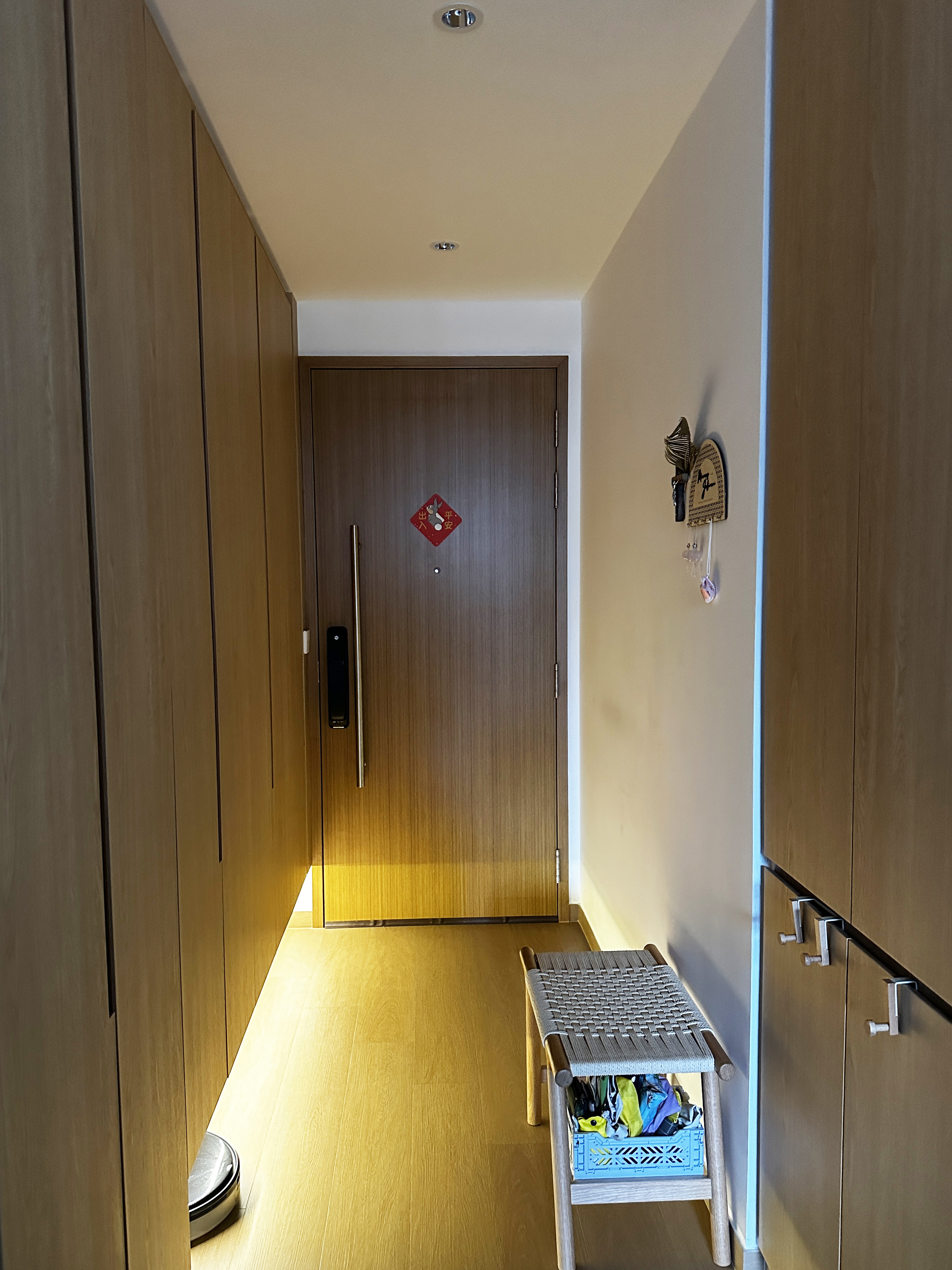 Our entryway with ample storage space - Wooden hallway, modern design, closed door, red diamond sign, Chinese characters