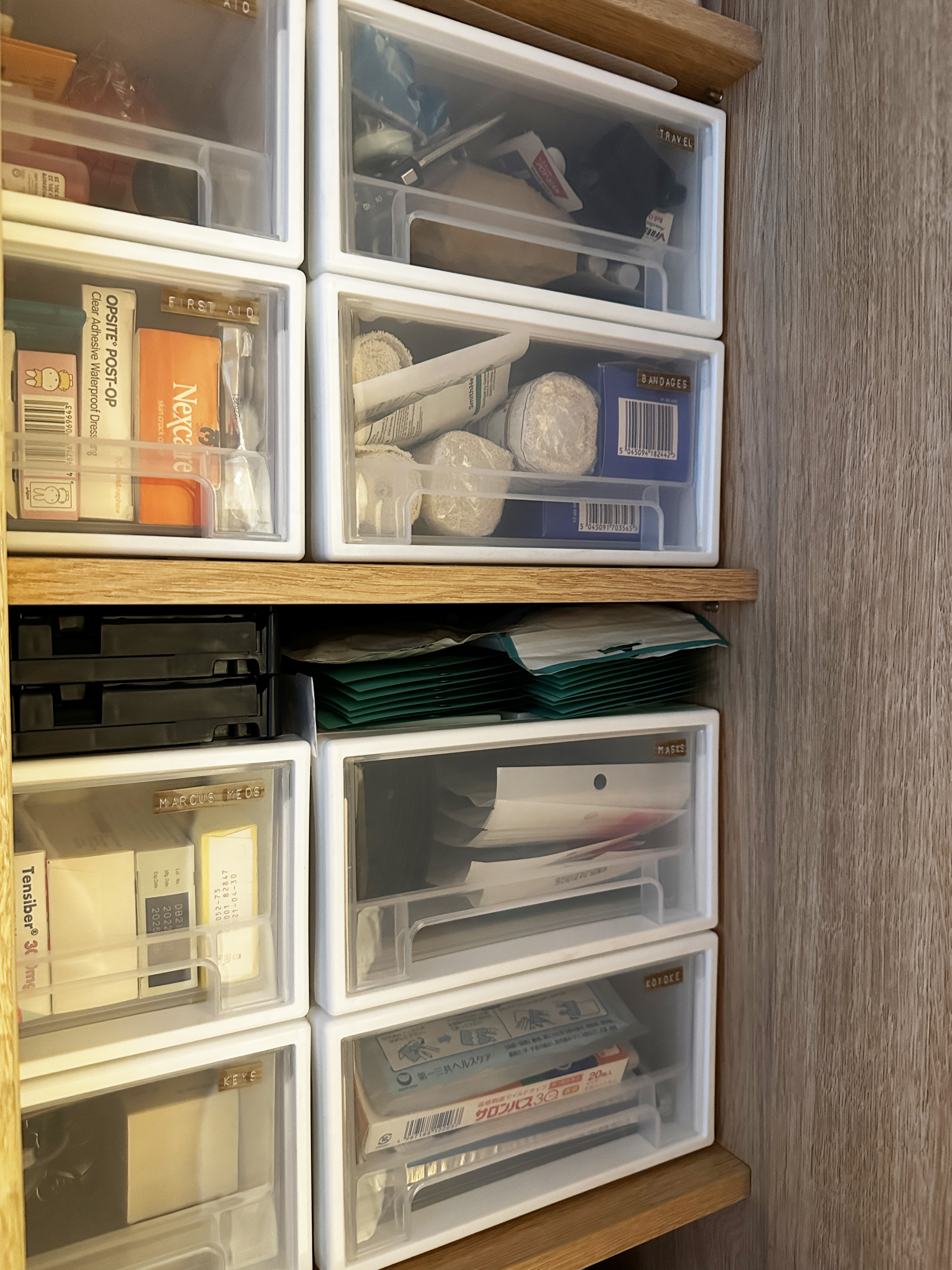 Our entryway with ample storage space - Clear plastic drawers, organized storage, medical supplies, labels, labels on boxes