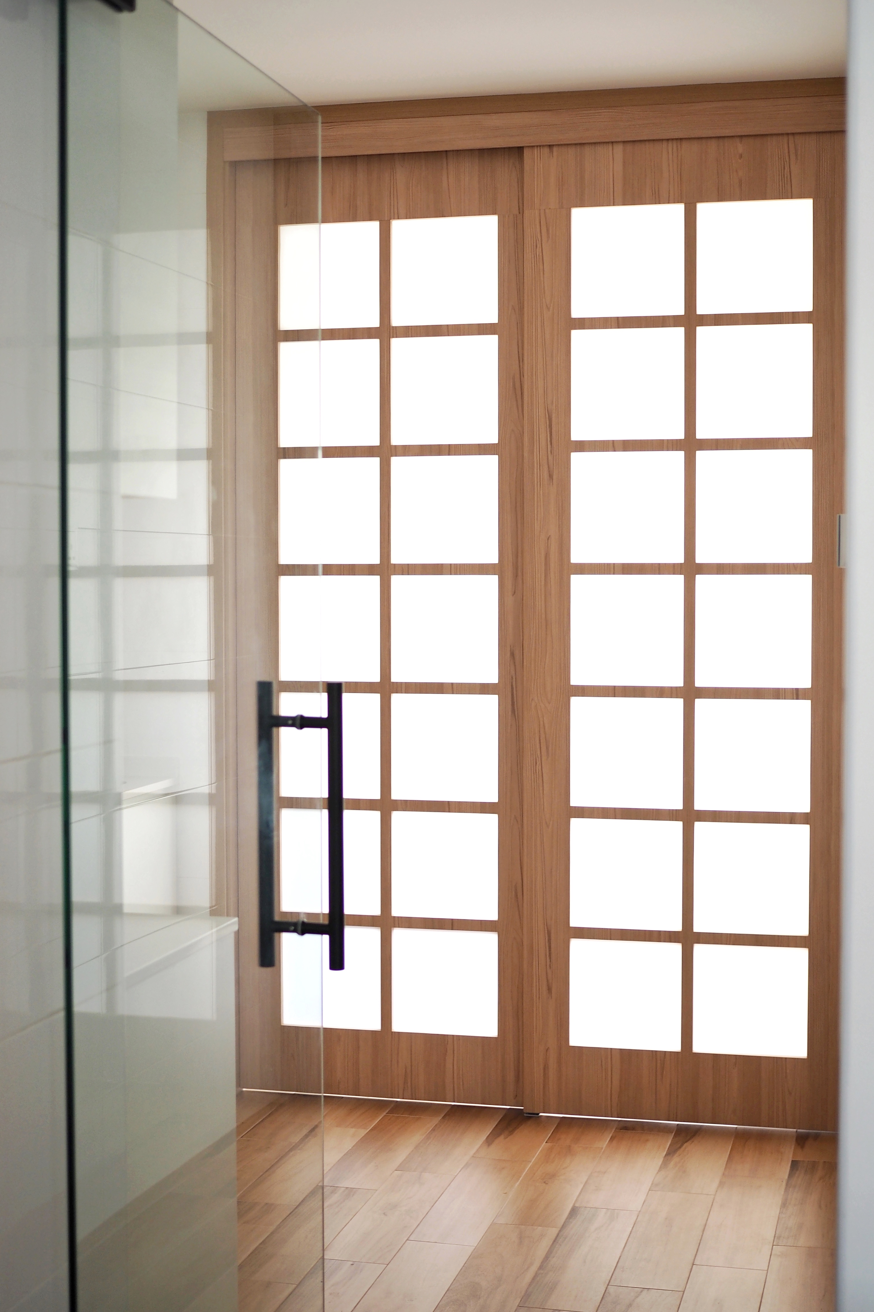 All things we are proud of in our home! - Wooden door with glass panels, modern interior design, minimalist aesthetic, large