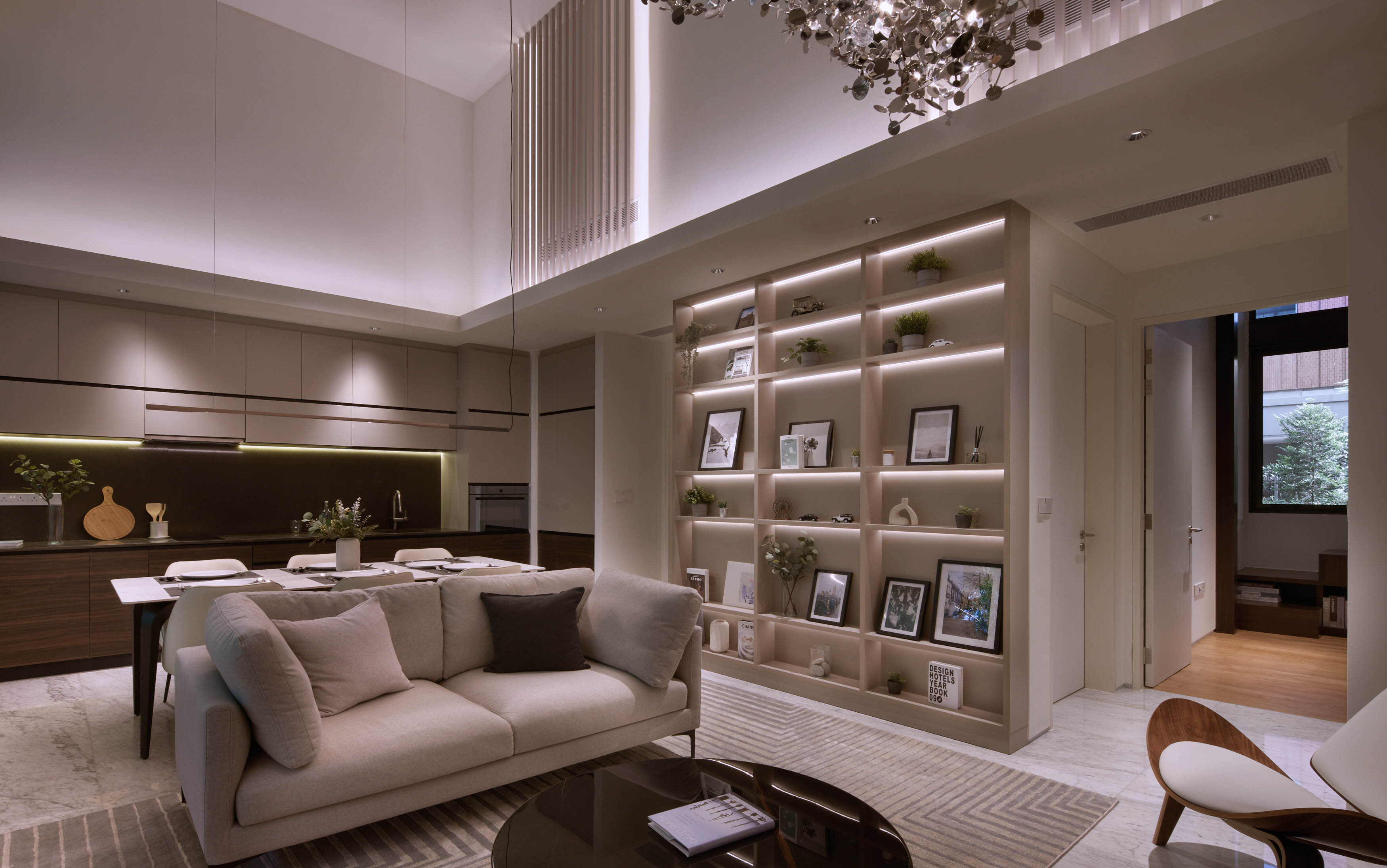 An Elegant And Sophisticated Space  - Modern living room with beige sofa, wooden coffee table, sleek kitchen with dark