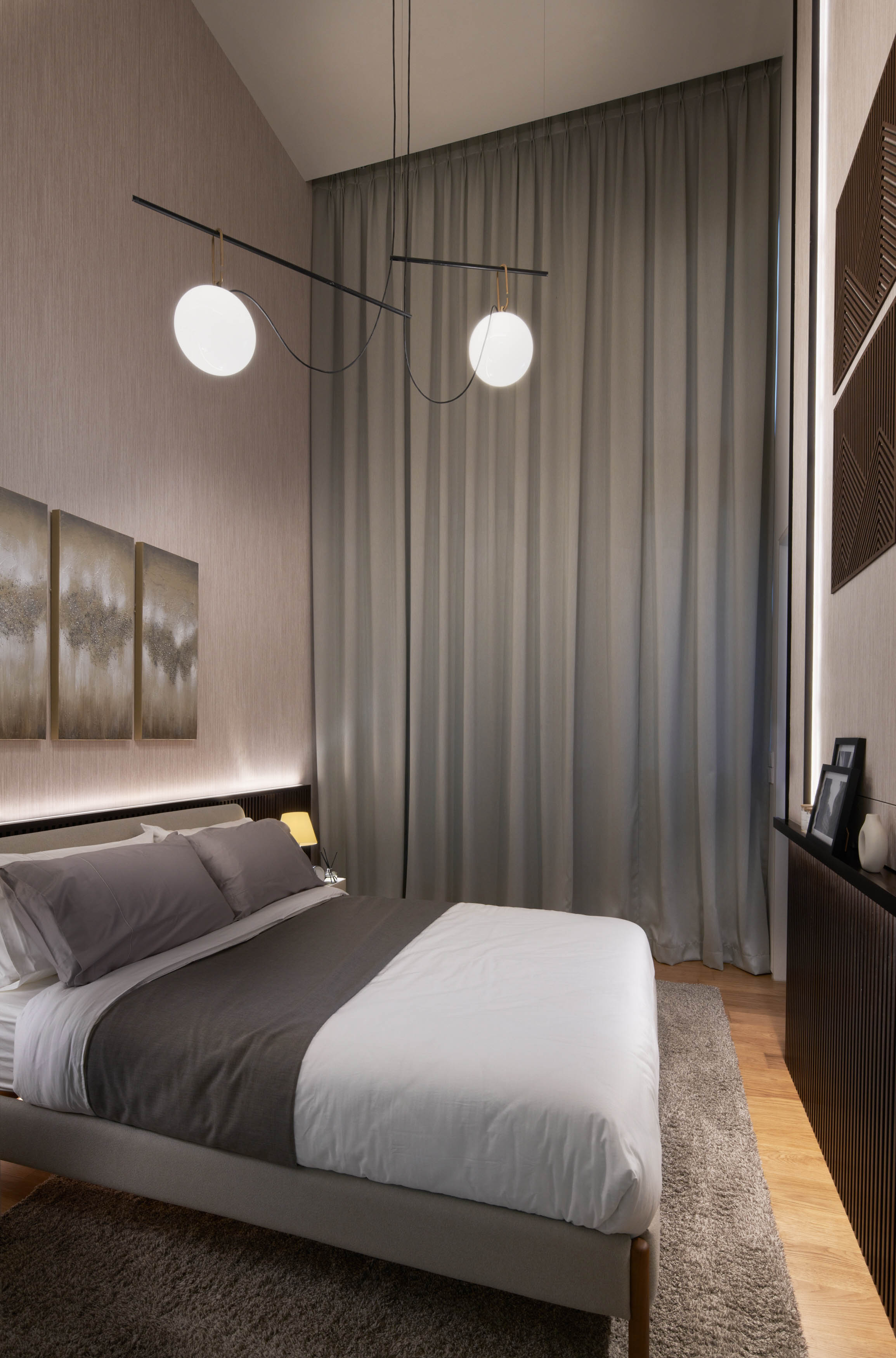 An Elegant And Sophisticated Space  - Modern bedroom with minimalist design, neutral color palette, large bed with gray and