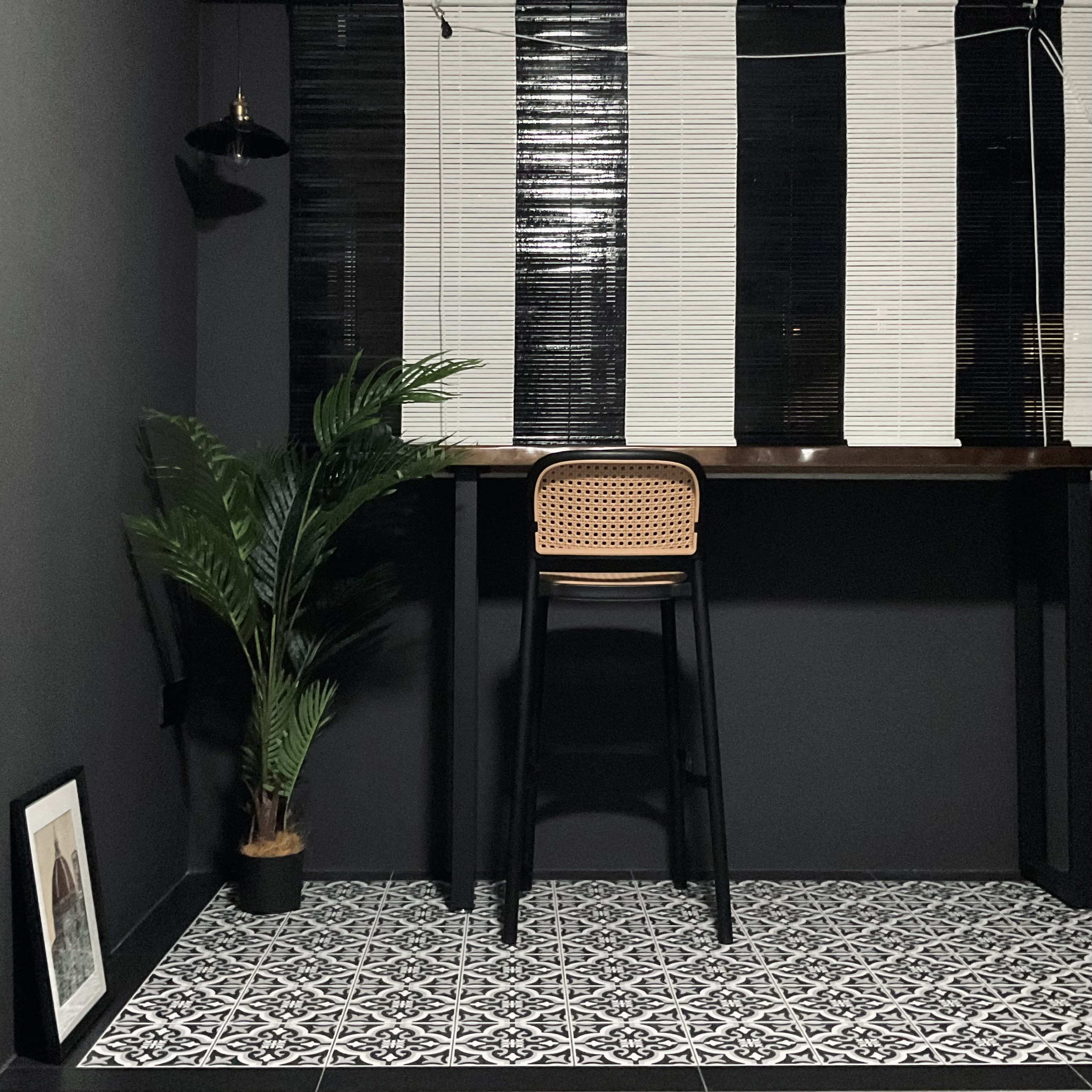 Our version of recreational area - the "balcony" - black and white patterned tiles, modern minimalist design, indoor plant