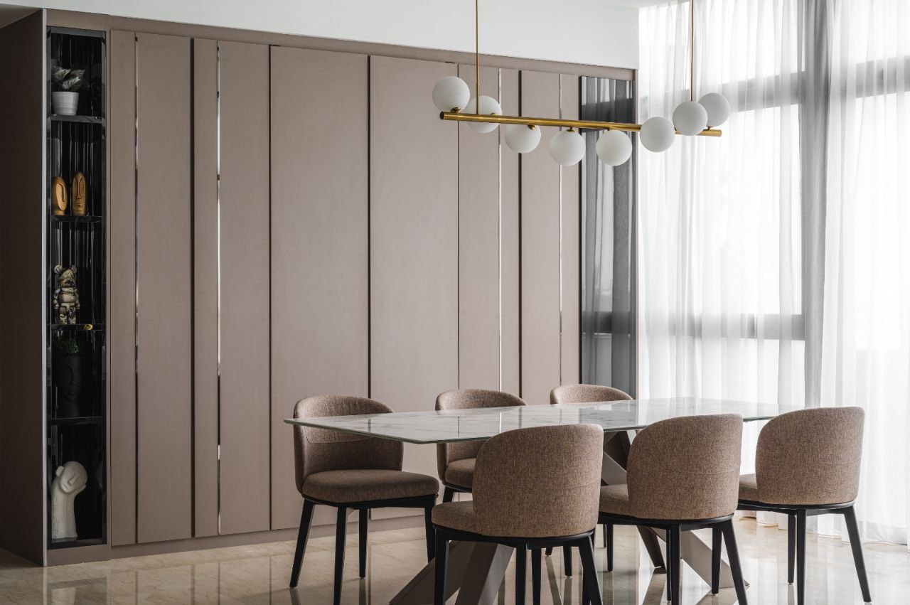 Bright and Airy Modern Home - Modern dining room with sleek, minimalist design, featuring a glass-top dining table surrounded