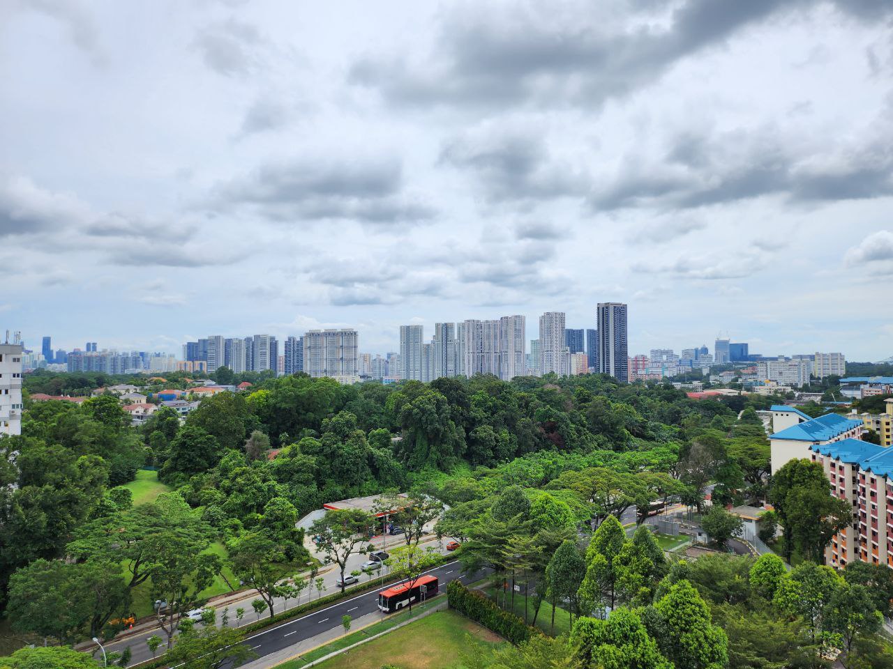 Bright and Airy Modern Home - Urban landscape with lush greenery and modern high-rise buildings, City skyline featuring