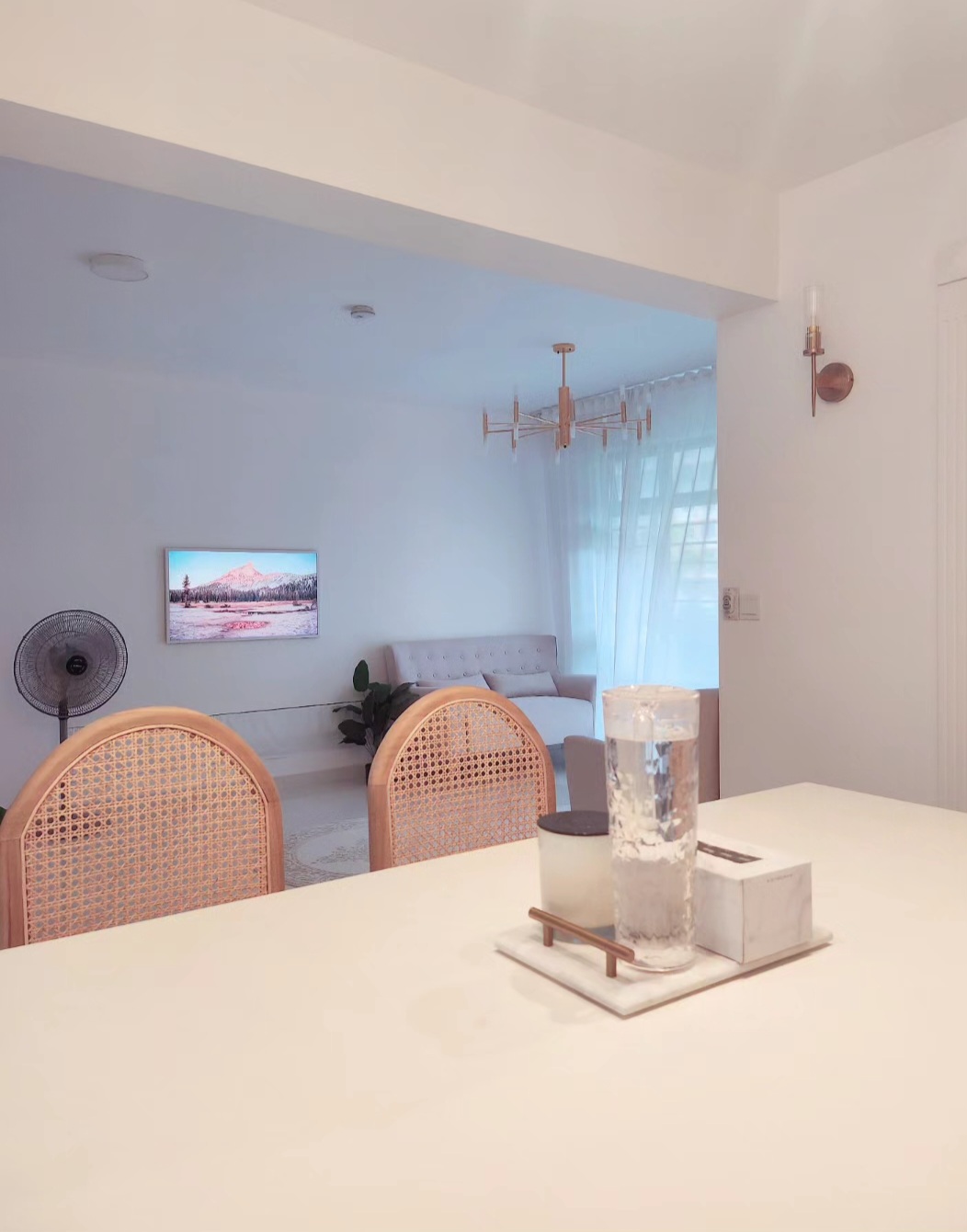 We saved $24400 from renovations & furnishing! - Minimalist living room, modern furniture, white walls, cozy seating, dining