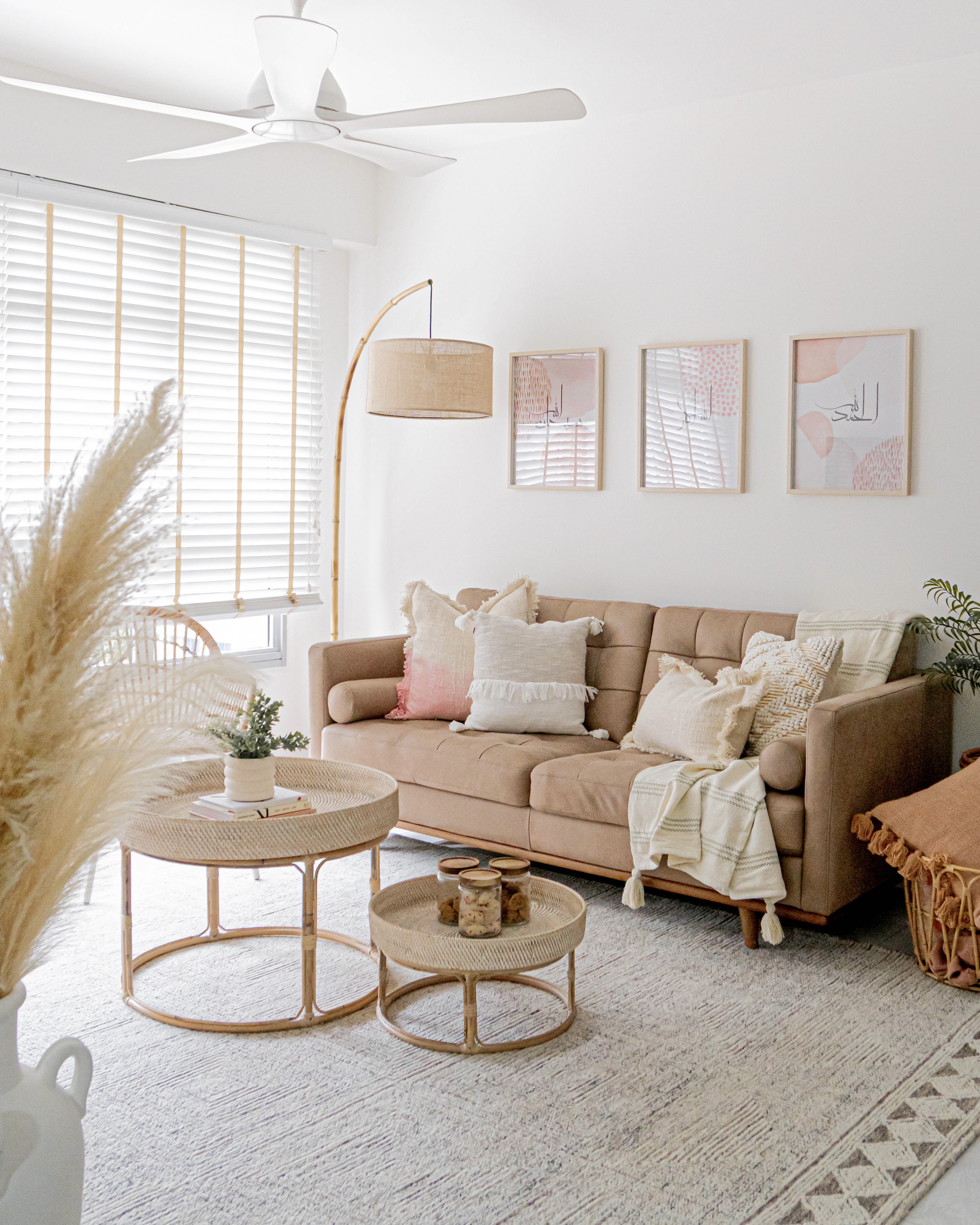 Japandi Living & Dining @ GreenFlora - Modern living room with beige sofa, white curtains, natural light, woven coffee table