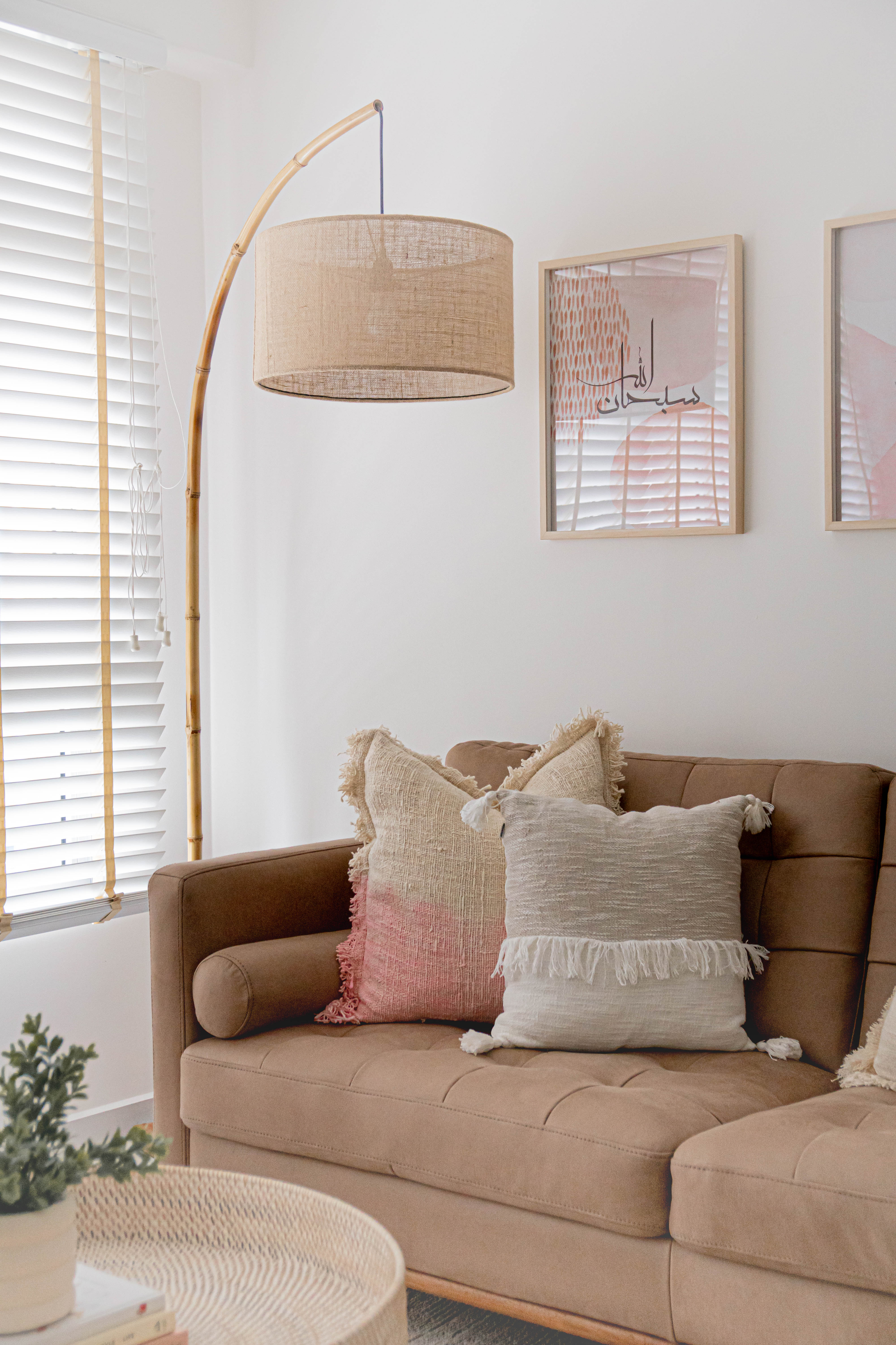 Japandi Living & Dining @ GreenFlora - Modern living room, cozy seating, brown sofa, textured pillows, abstract art, natural