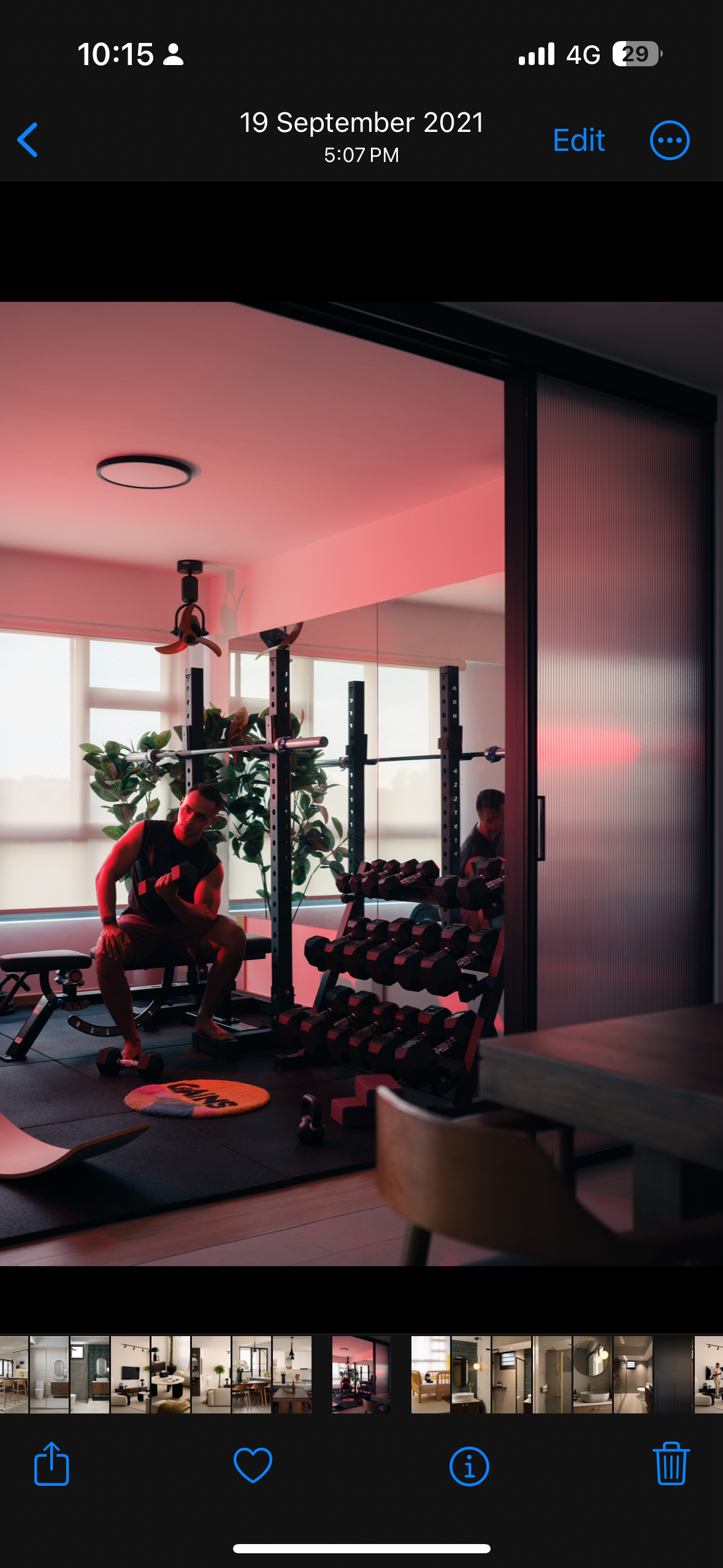 A mid-century modern home in the East - Interior gym scene with a person performing a workout, Fitness room with modern decor