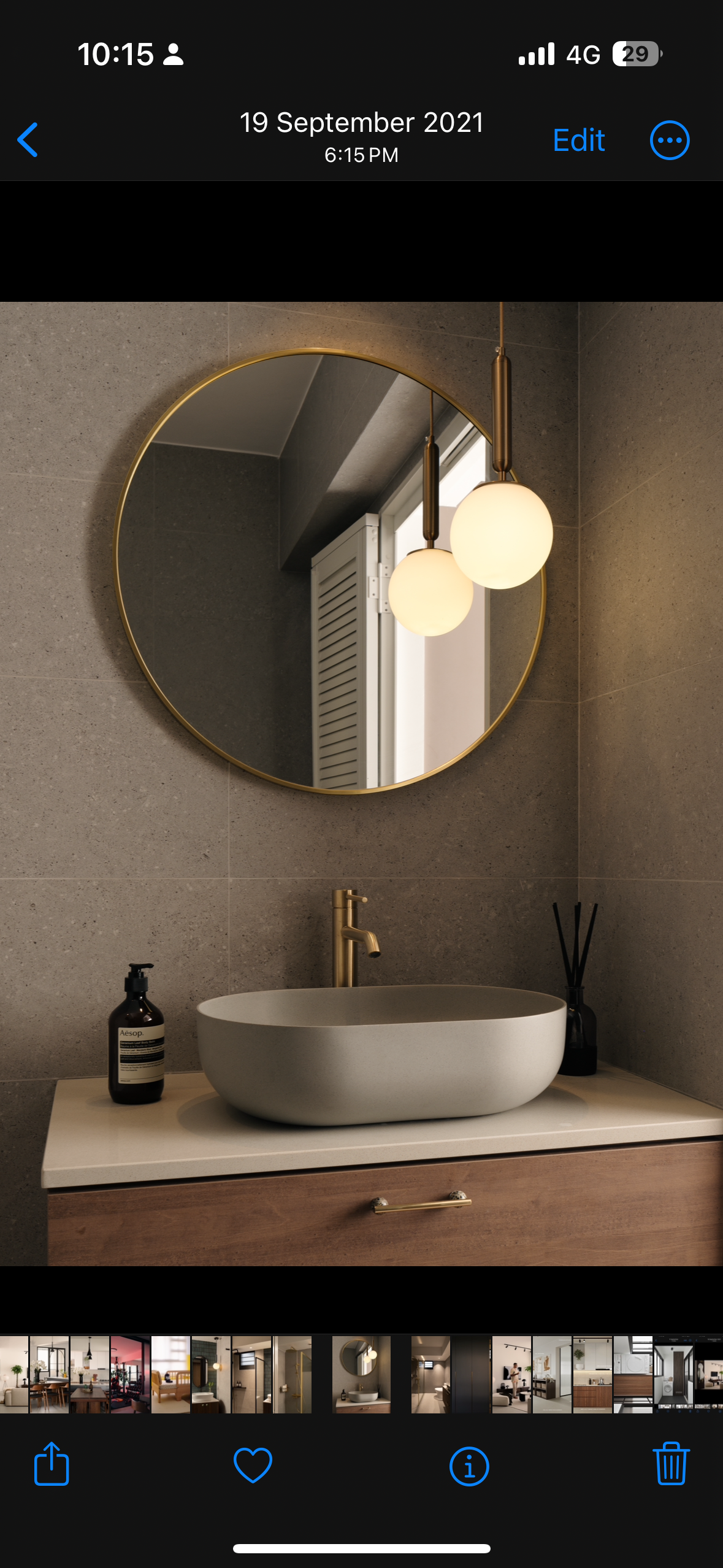 A mid-century modern home in the East - Modern bathroom vanity with sleek design, Elegant bathroom mirror and pendant lights