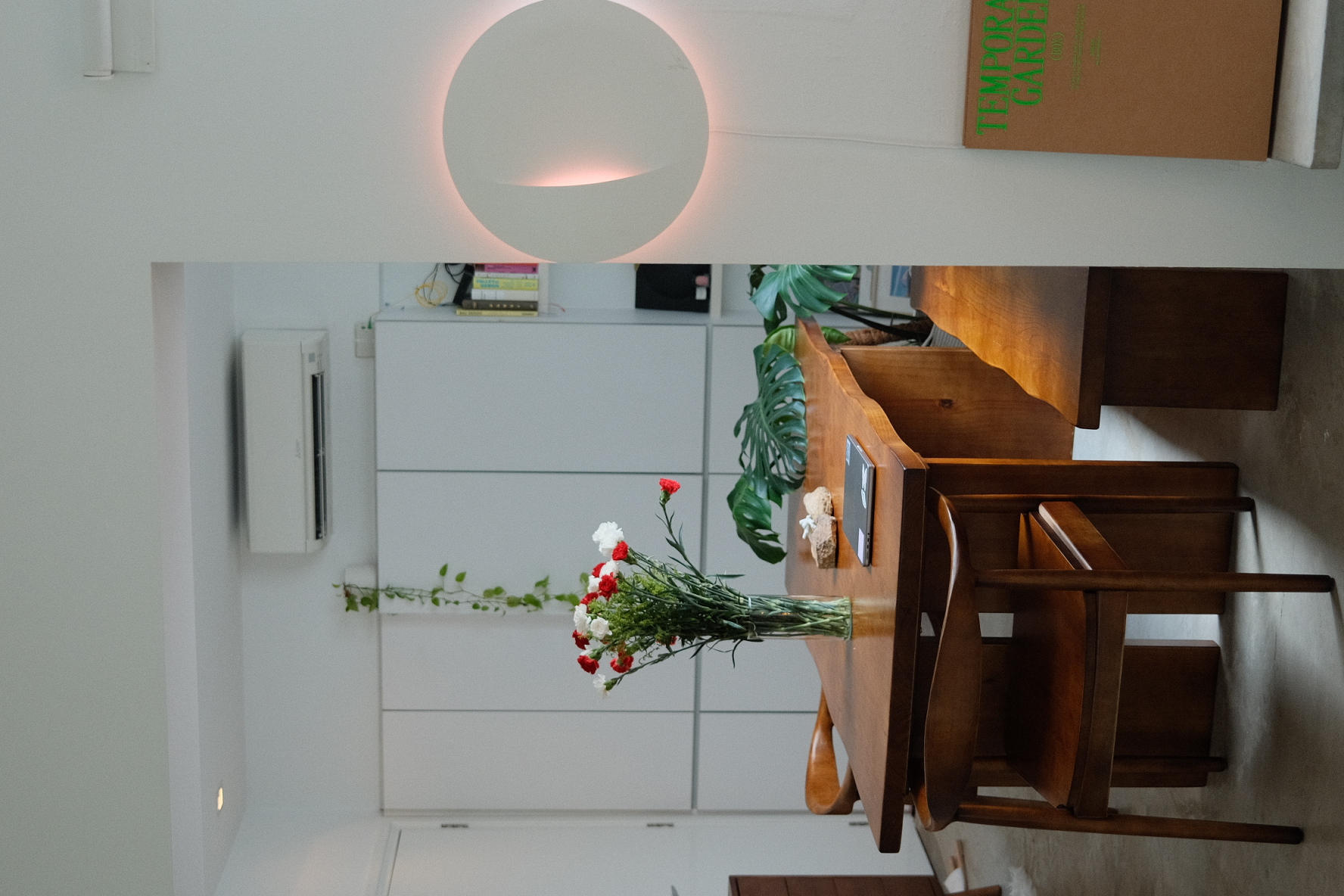 Welcome to a rented home designed to create and inspire - Modern minimalist interior, white walls, sleek furniture, wooden